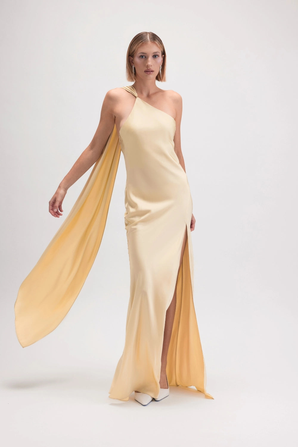 Fore Collection The Andee Dress in soft fabric, featuring a stylish silhouette with a V-neckline and elegant design.