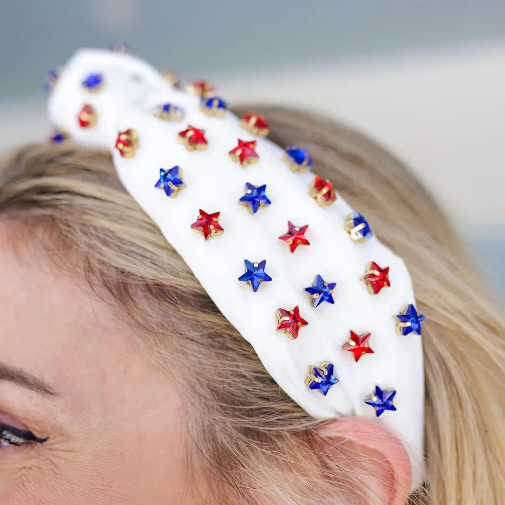 White star-spangled banner headband by Brianna Cannon featuring patriotic stars and stripes, perfect for festive occasions.