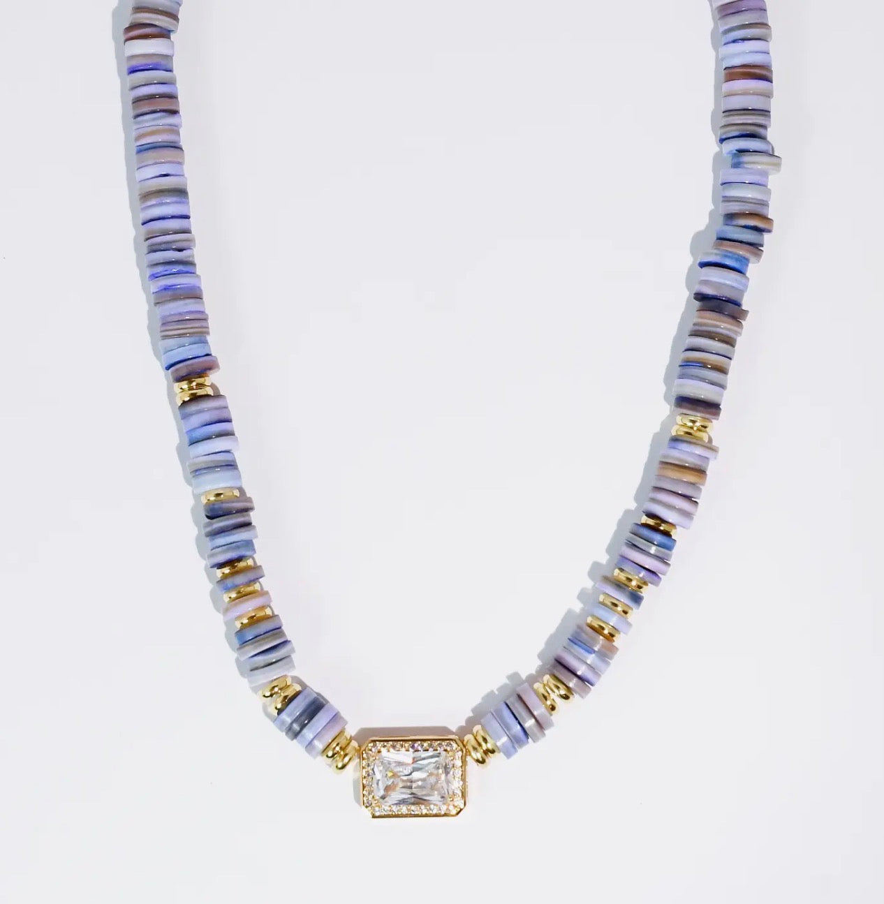 Treasure Jewels Dream Pop gemstone necklace featuring a colorful, polished gem on a delicate chain.