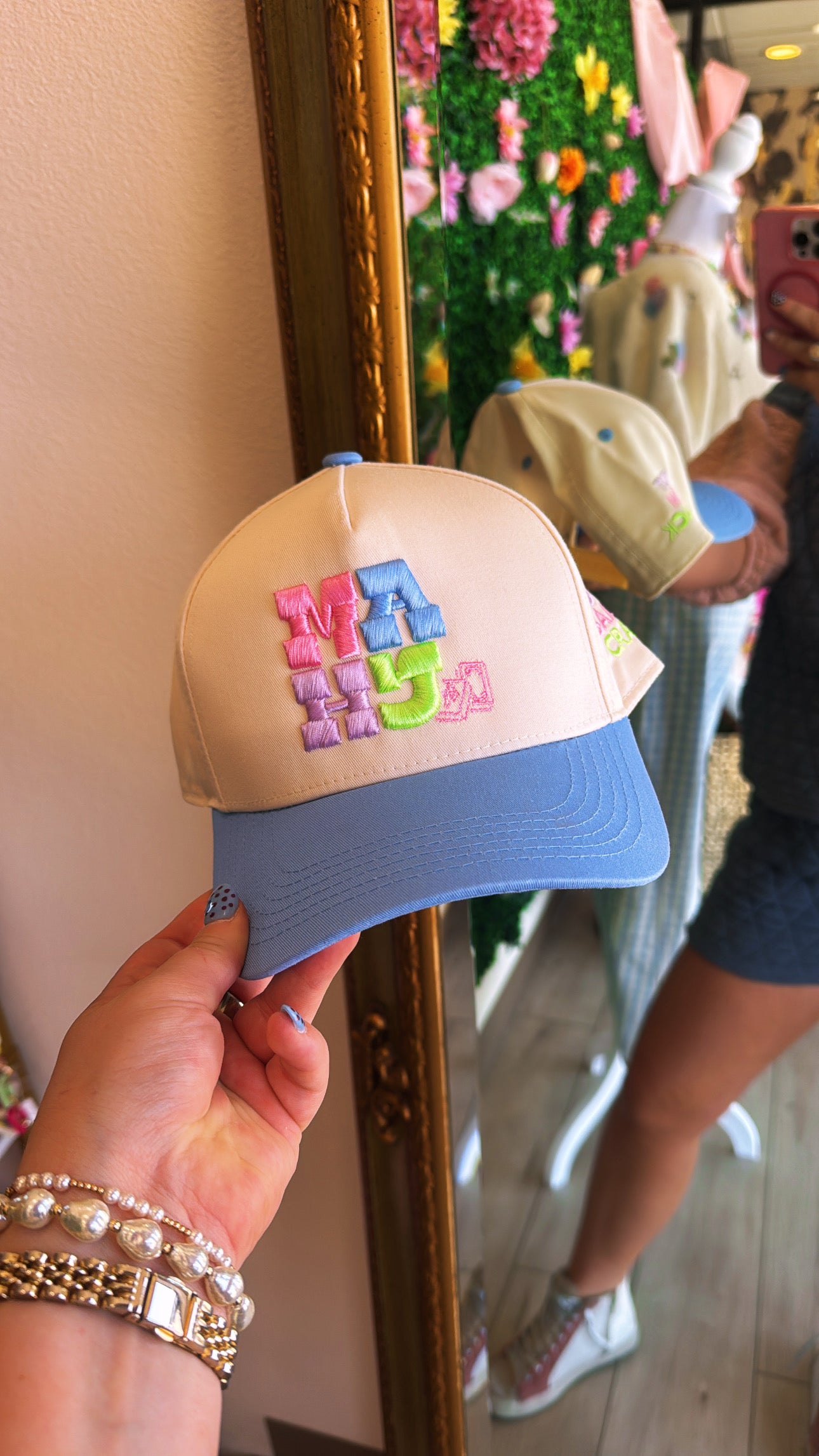 Blue MAJH Hat by Summer Tees featuring a stylish design, shown on a model with a casual summer outfit.
