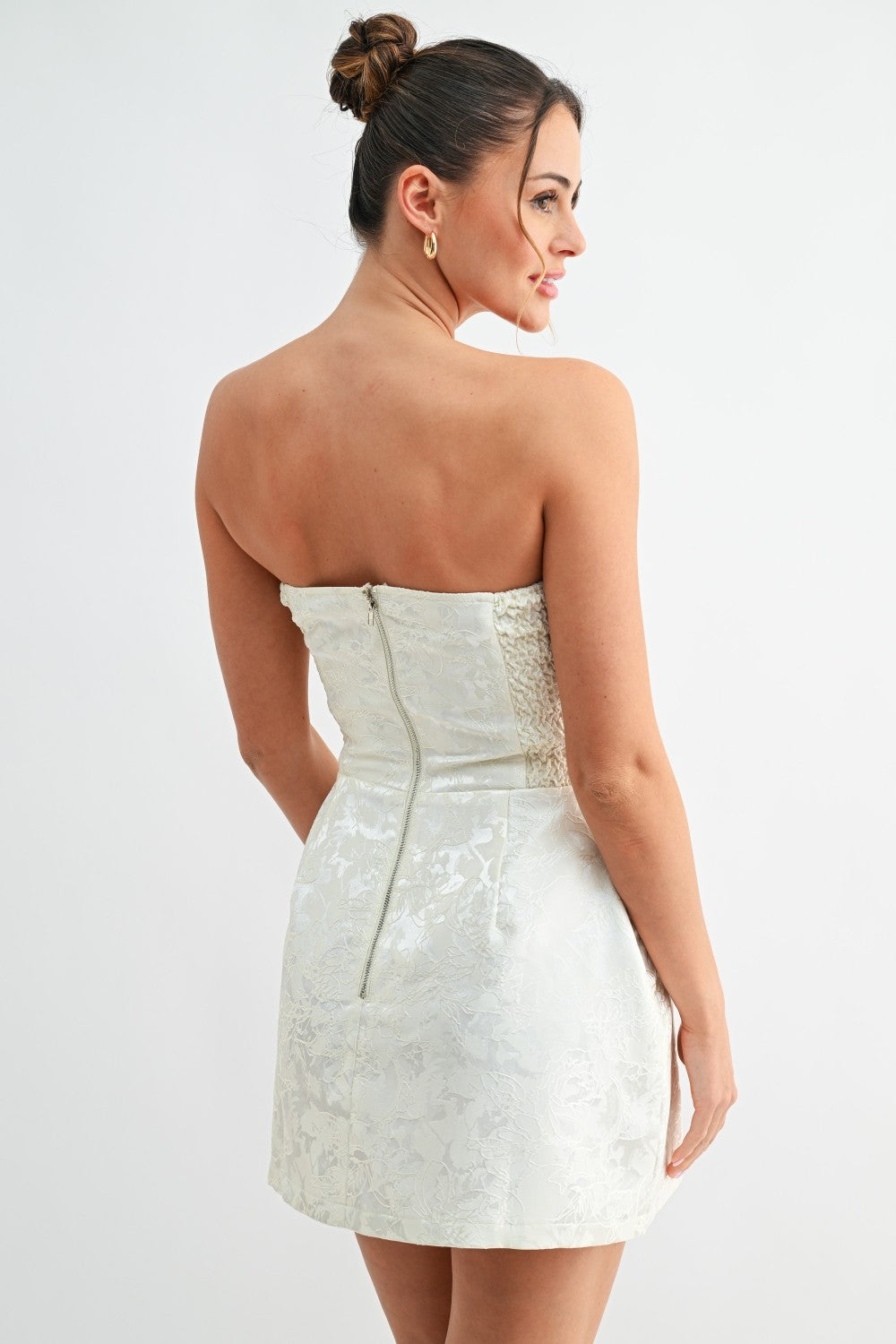Evenuel Skyline Jacquard Mini Dress displayed on a mannequin, featuring intricate pattern and stylish silhouette.