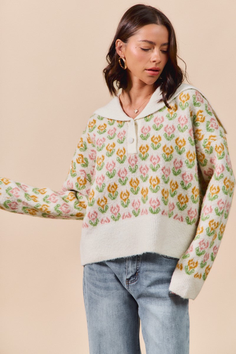 So Me Flora Voyage sweater in cozy knit, featuring vibrant floral patterns and a relaxed fit, perfect for casual wear.