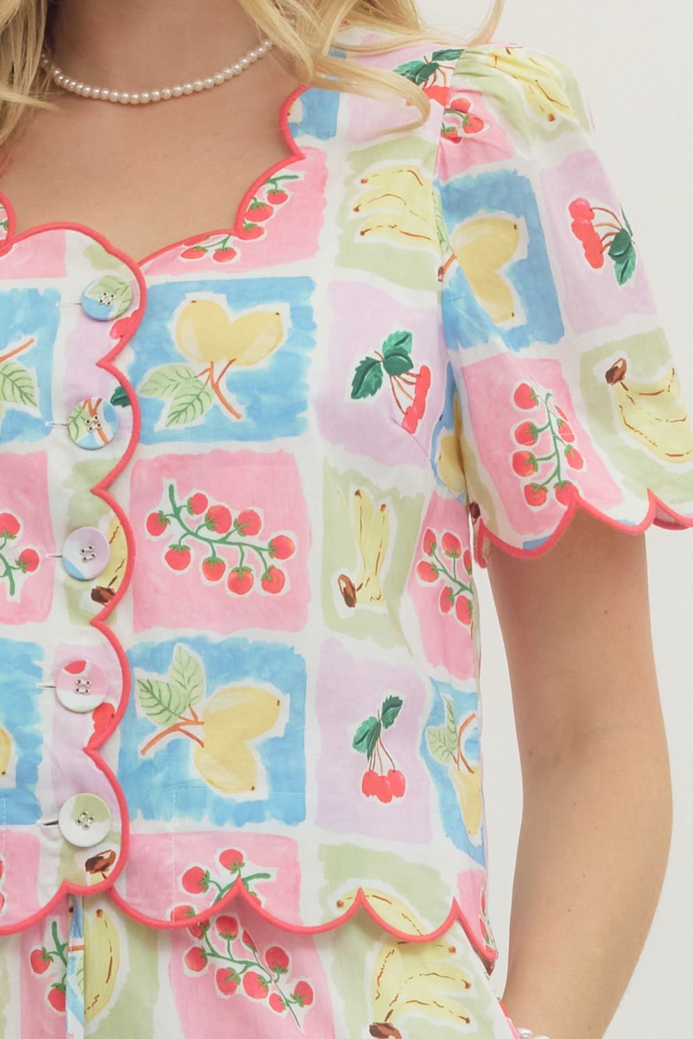 Entro Fruit Splash Blouse featuring vibrant floral print and lightweight fabric, perfect for casual or summer wear.