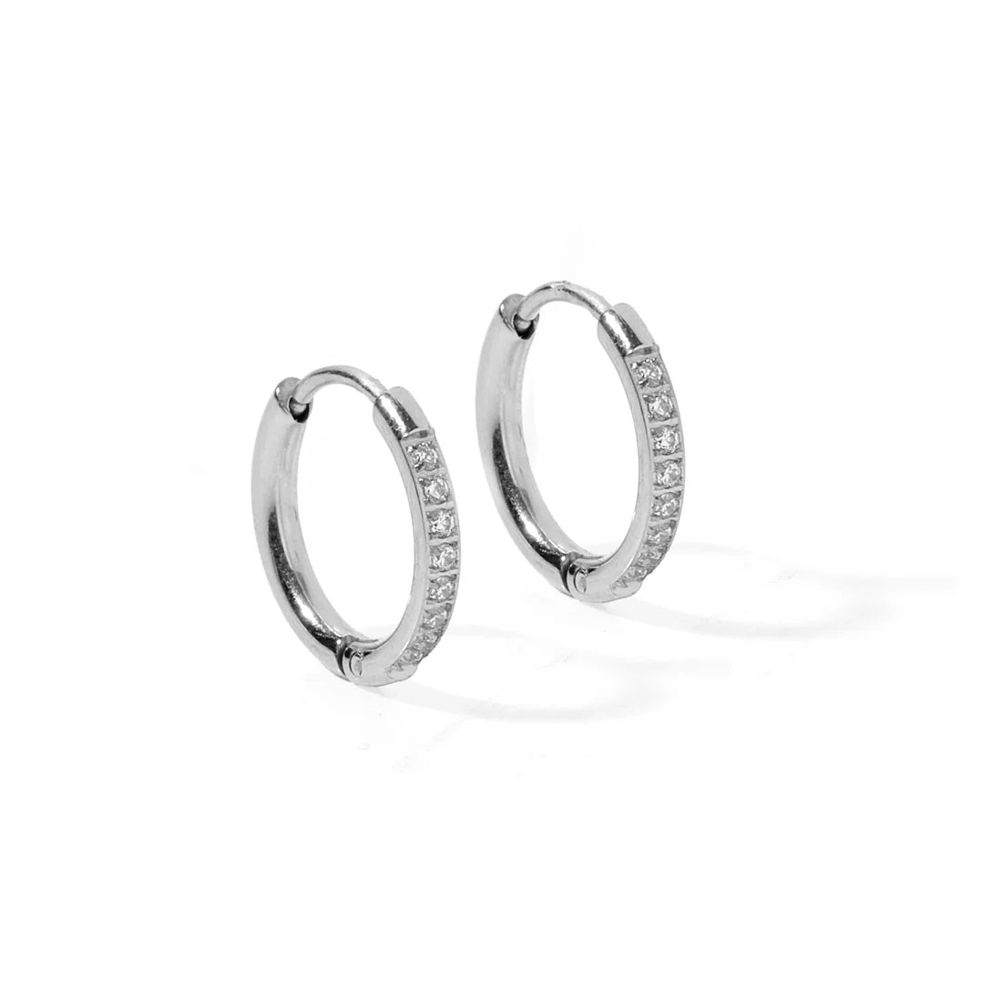 Silver Scarlett hoop huggie earrings by Linny Co featuring 12mm size and sparkling CZ stones on a sleek silver design.