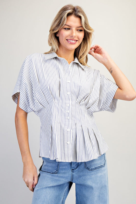 Eesome main character pleated top in neutral color, featuring a stylish pleated design and relaxed fit.