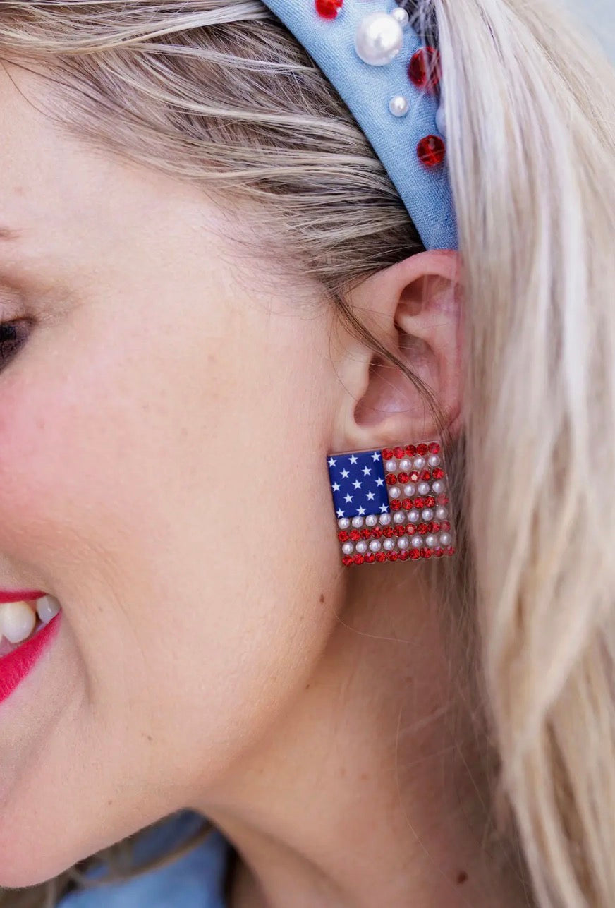 Patriotic stud earrings by Brianna Cannon featuring red, white, and blue design with small star accents.