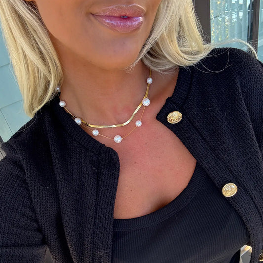 Avery Necklace by chansuttpearls featuring elegant freshwater pearl beads on a delicate chain.