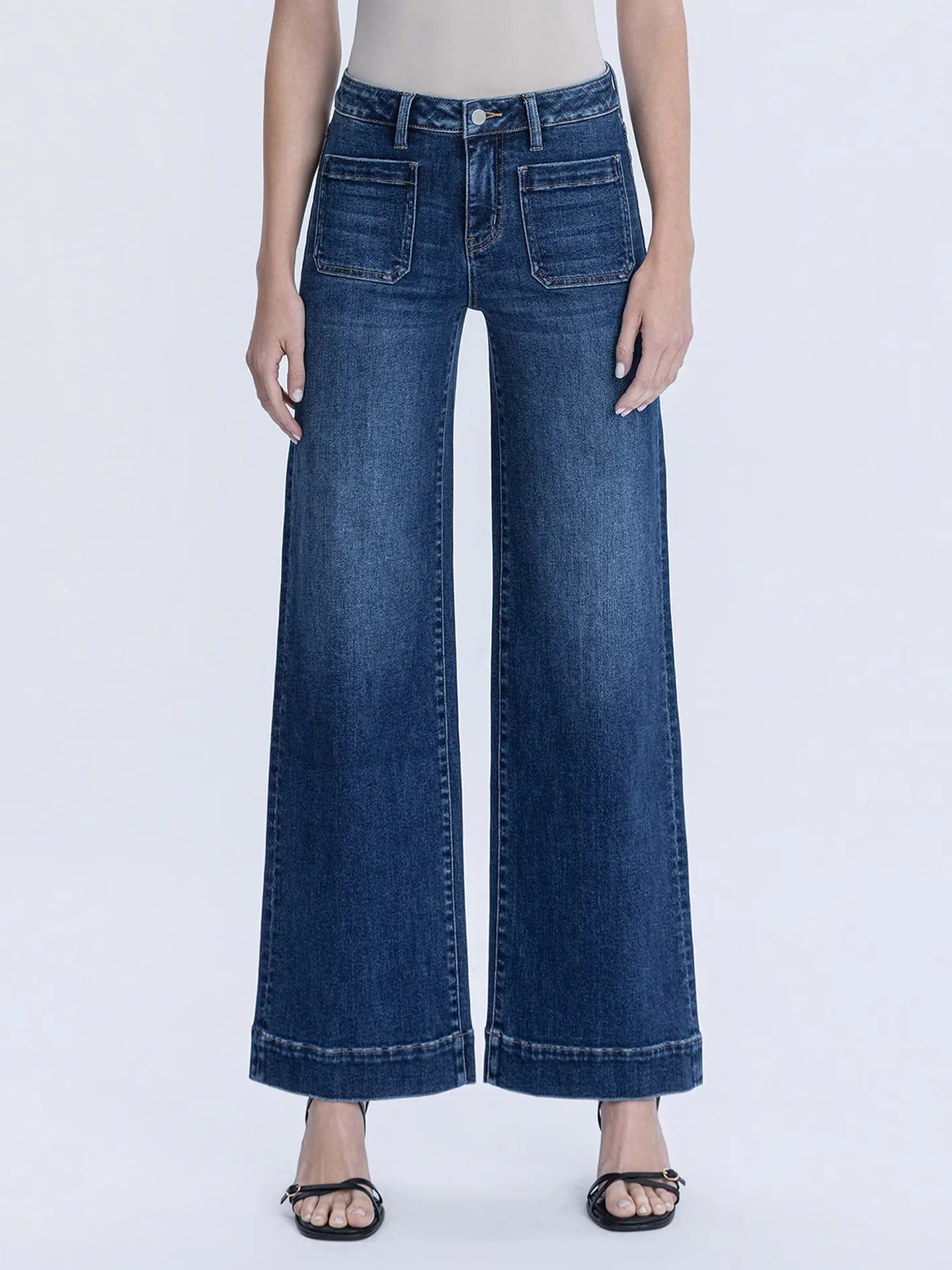 Flying Monkey Harper wide leg jeans shown on a model, featuring a relaxed fit, high waist, and light denim wash.