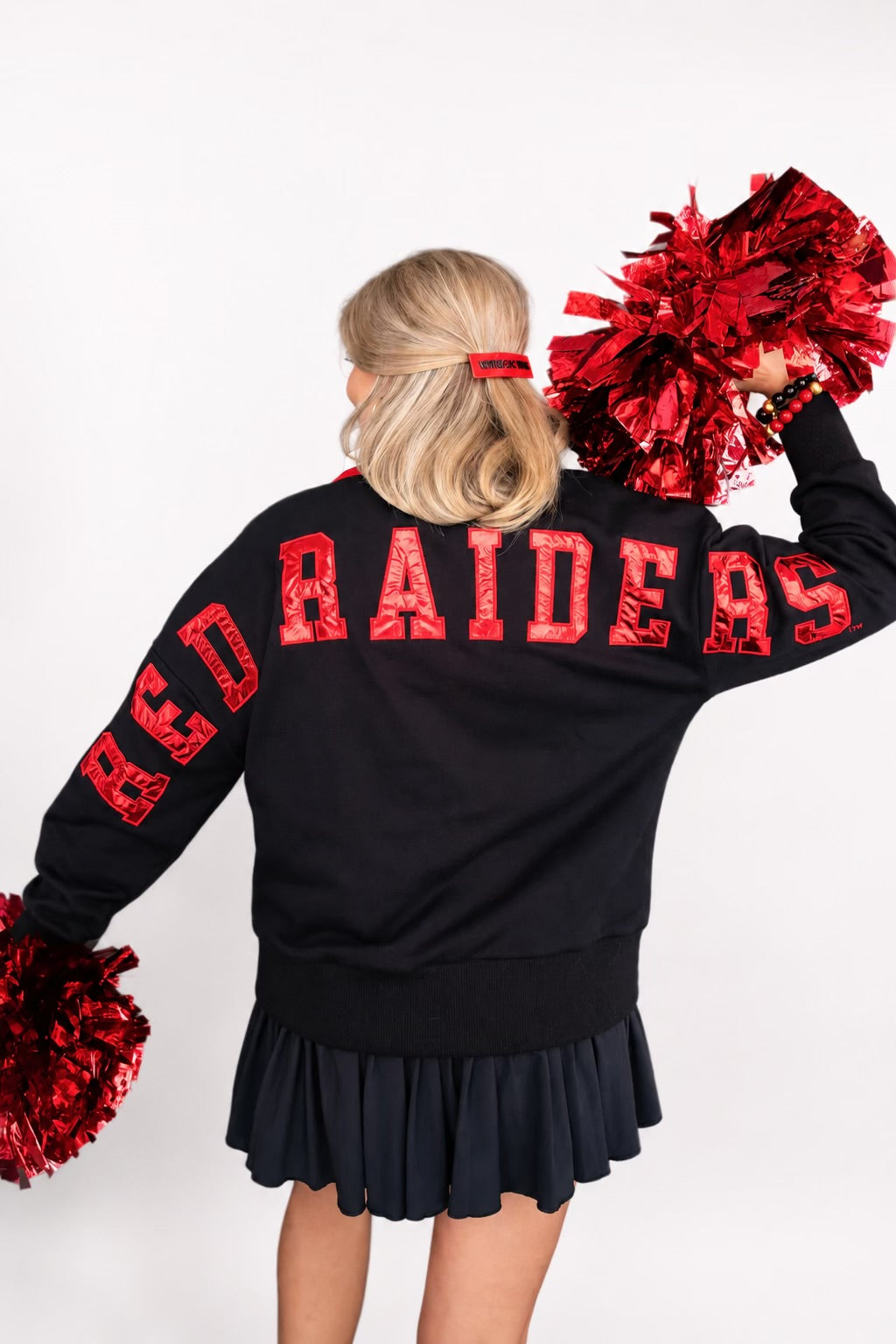 Brianna Cannon Raider Clubhouse sweatshirt in gray, featuring a crewneck design and logo print on the front.