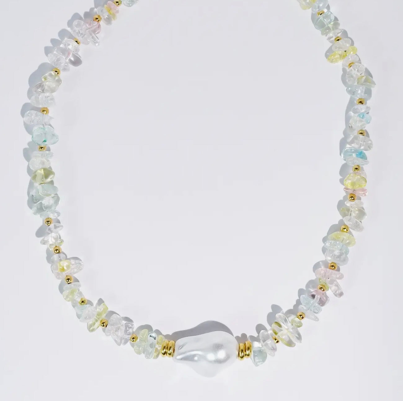 Treasure Jewels Enchanted Pearl Gemstone Necklace featuring a delicate string of lustrous pearls and sparkling gemstones.