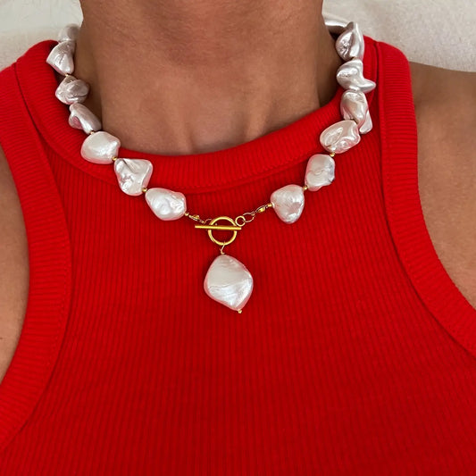 Chansuttpearls chunky pearl necklace with large white pearls on a delicate chain, stylish jewelry for elegant outfits.