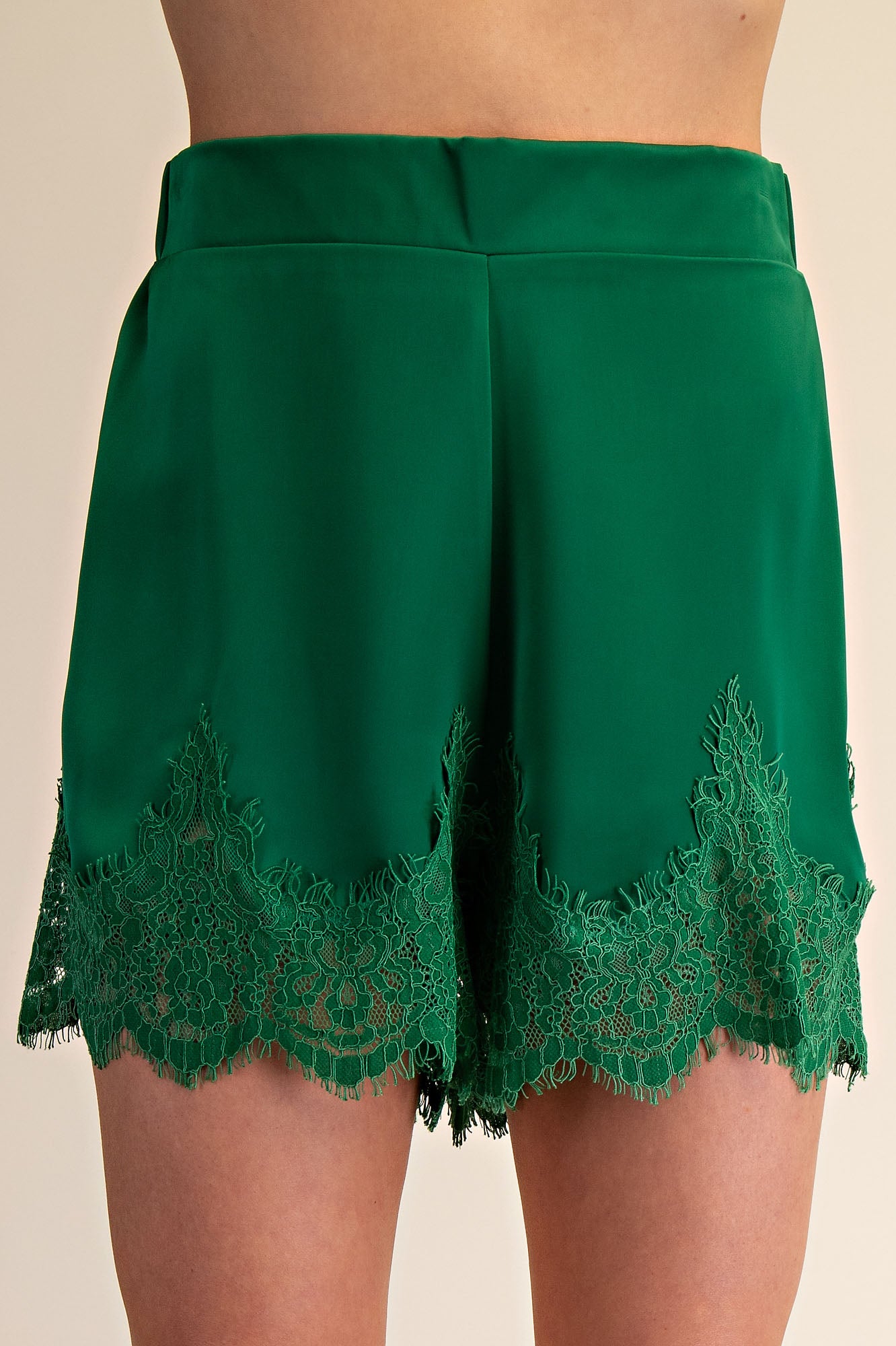 GLAM Silk Haven emerald shorts featuring smooth silk fabric, high waist design, and stylish fit, perfect for a chic summer look.