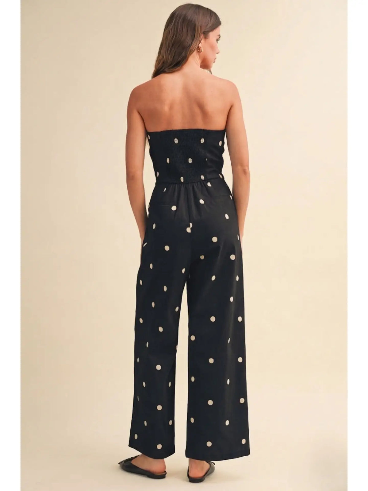 Klesis After Hours jumpsuit in black, featuring a stylish, fitted design with long sleeves and a sleek, modern silhouette.