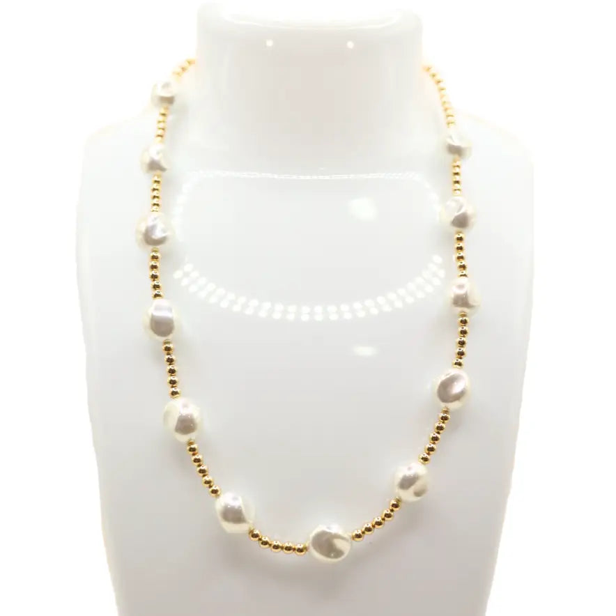 Sadie Pearl Necklace by Beaded Blondes featuring white pearl beads and delicate beaded accents on a fine chain.