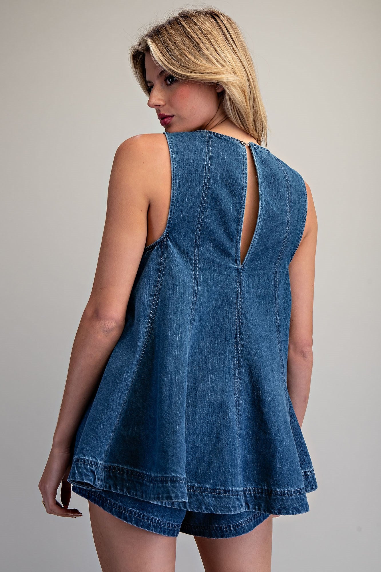 Ee:some Laidback Babe Top displayed on a hanger, featuring soft fabric and casual style perfect for relaxed everyday wear.