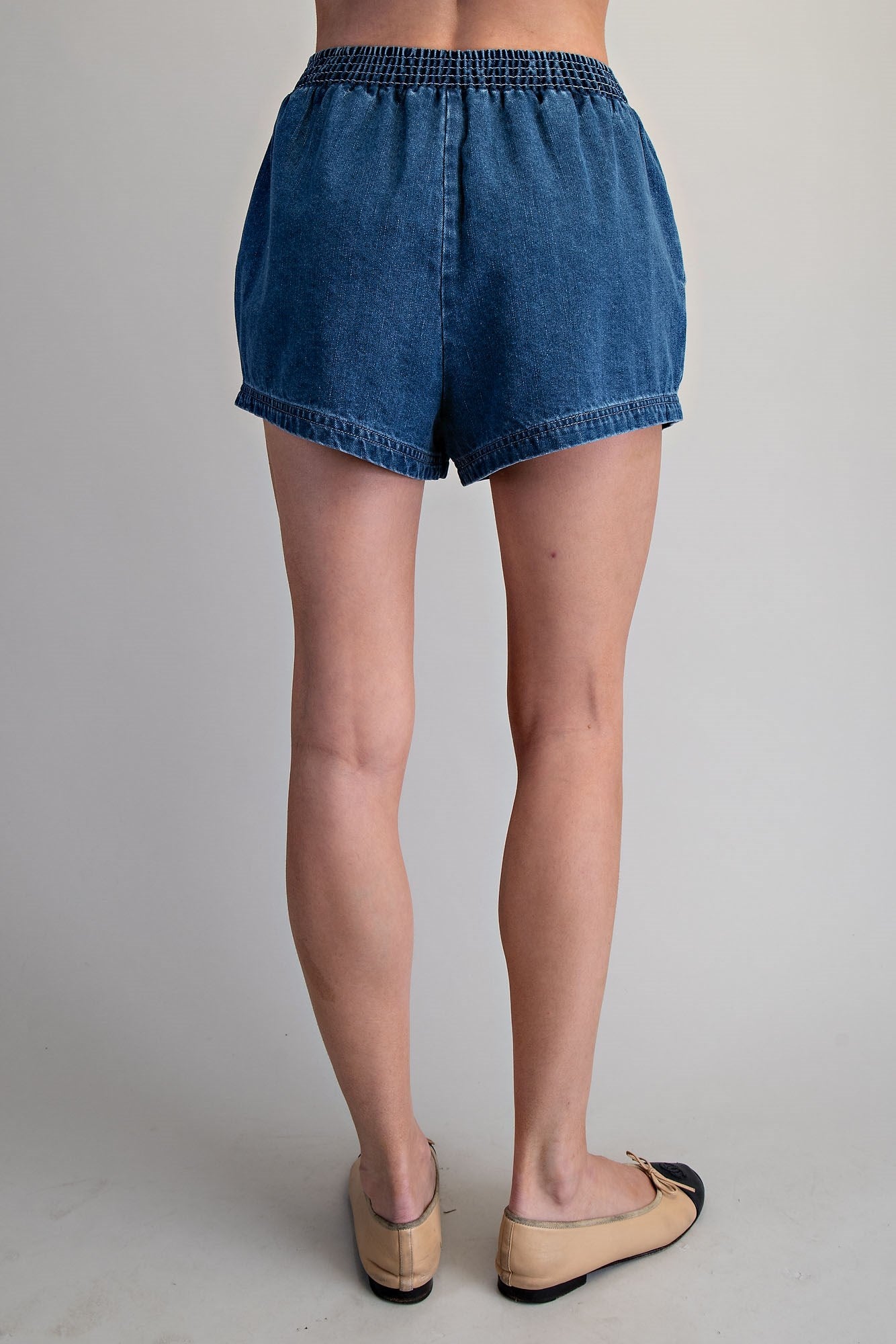 Light blue Laidback Babe shorts by Ee:some, featuring a relaxed fit and casual style, with visible stitching and elastic waistband.