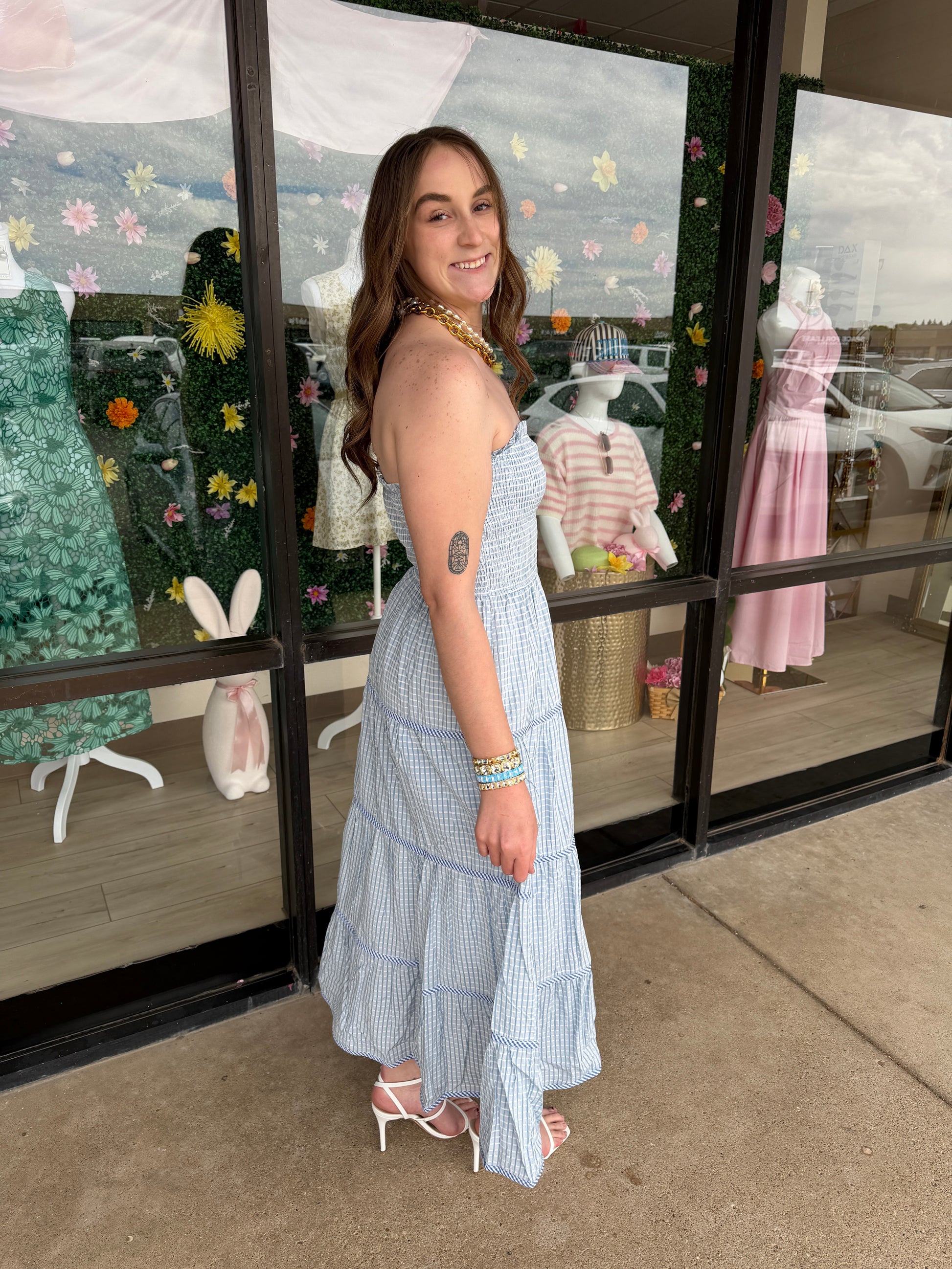 Baby Pink Soft Statement Midi Dress in baby blue, showcasing a flowing midi length dress with soft fabric and elegant design.