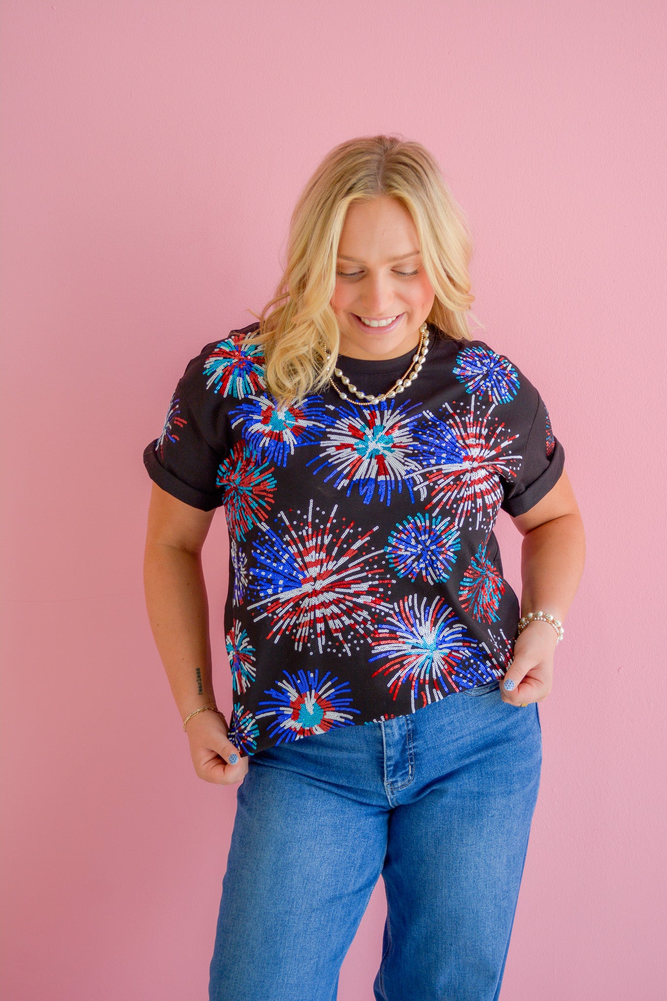 Rjm Glitz Midnight Firecracker T-shirt featuring a dark background with vibrant firecracker graphic design.