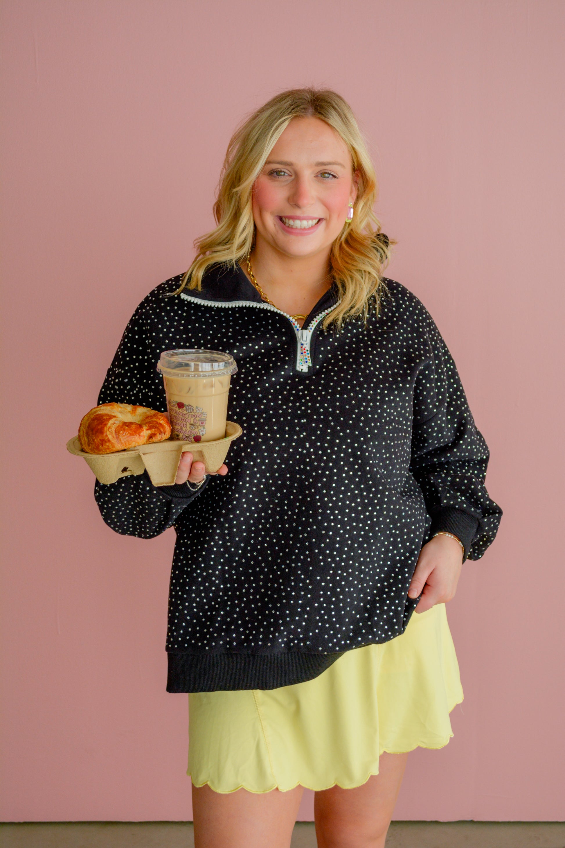 Sparkle & Sport quarter zip top by Bell St Boutique, close-up view of the stylish silver-colored fabric and quarter zipper detail.