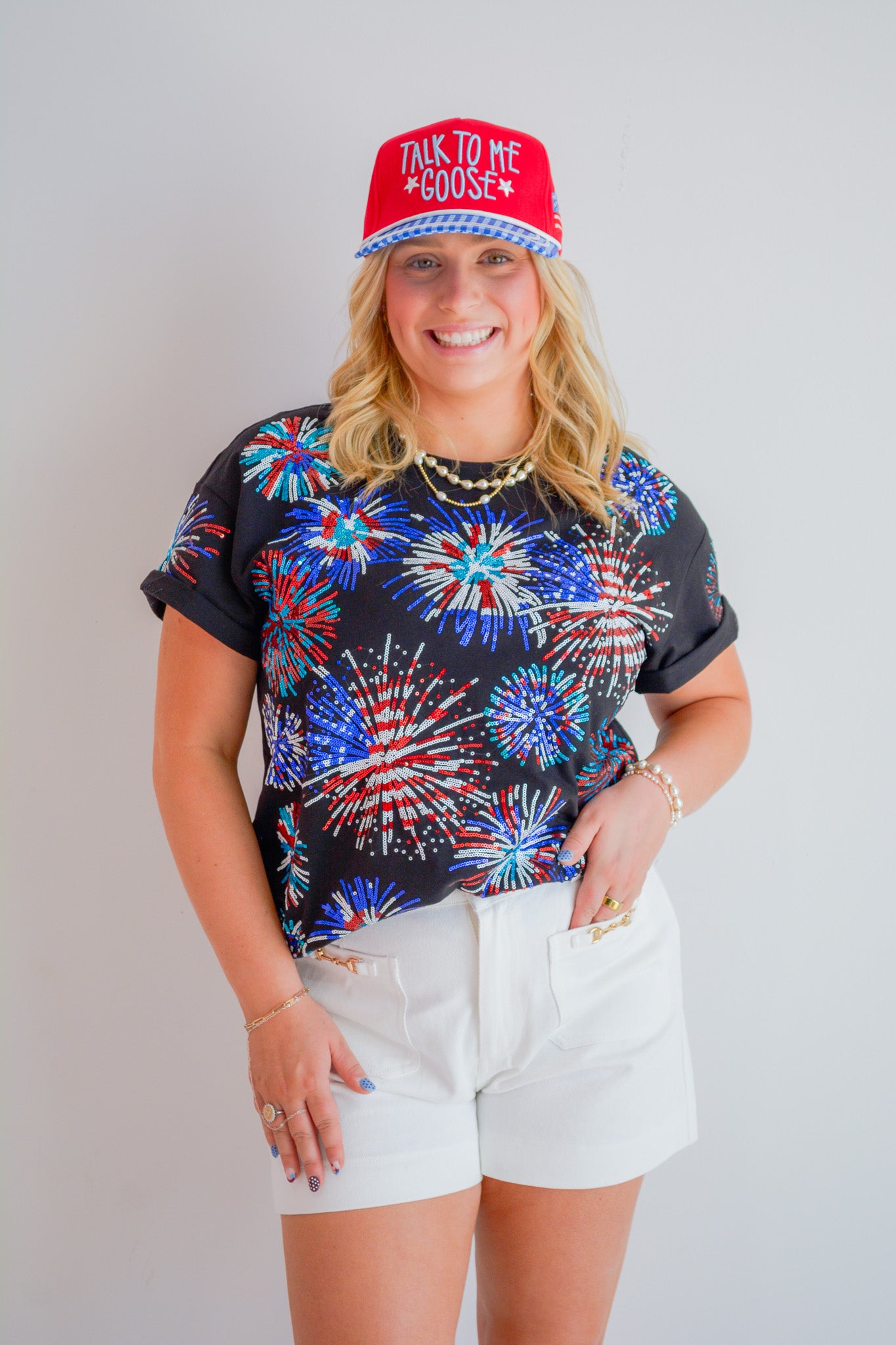 Rjm Glitz Midnight Firecracker Tee featuring a dark fabric with vibrant firecracker graphic design.