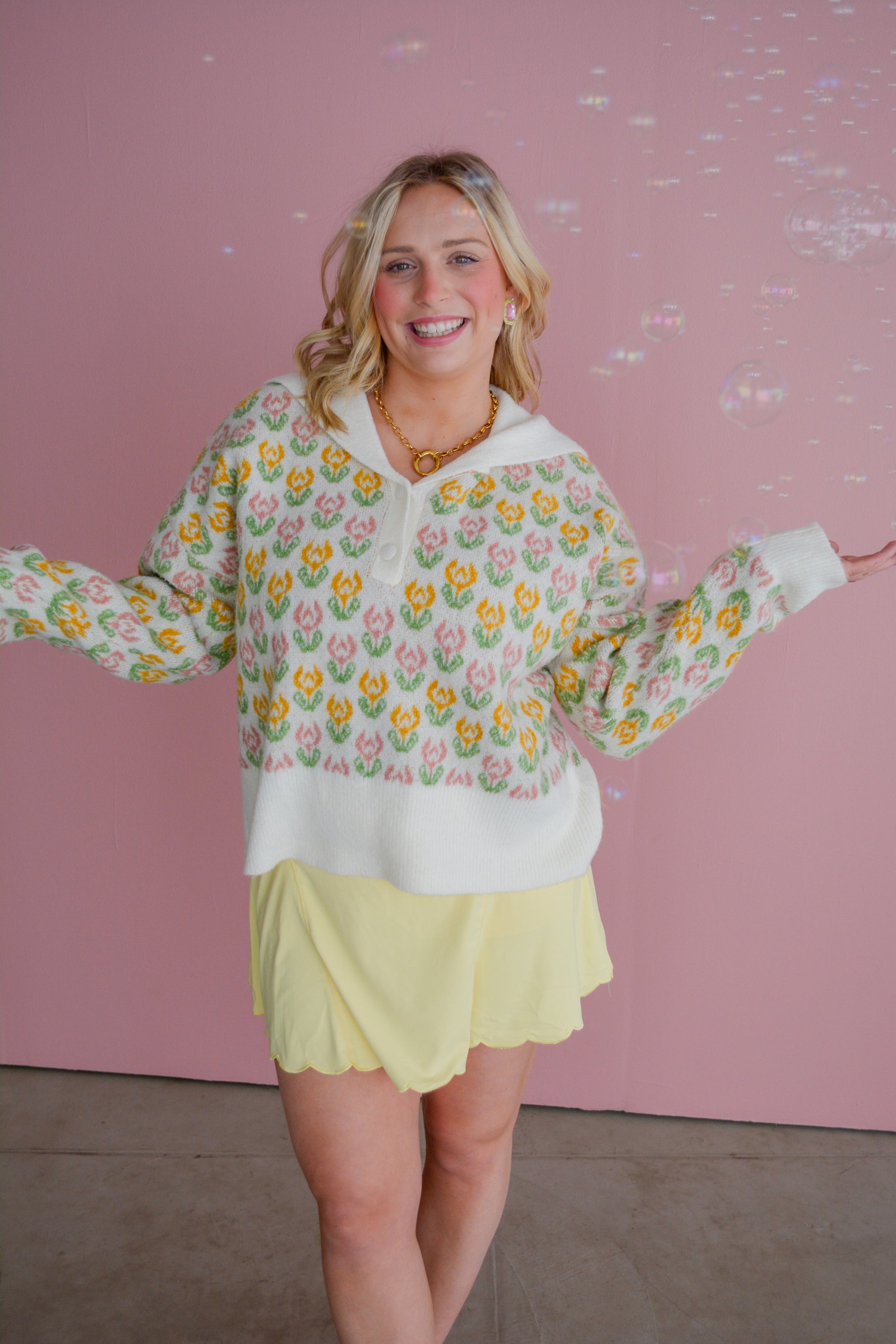 So Me Flora Voyage sweater featuring a floral pattern, cozy knit, and vibrant colors, displayed on a mannequin.