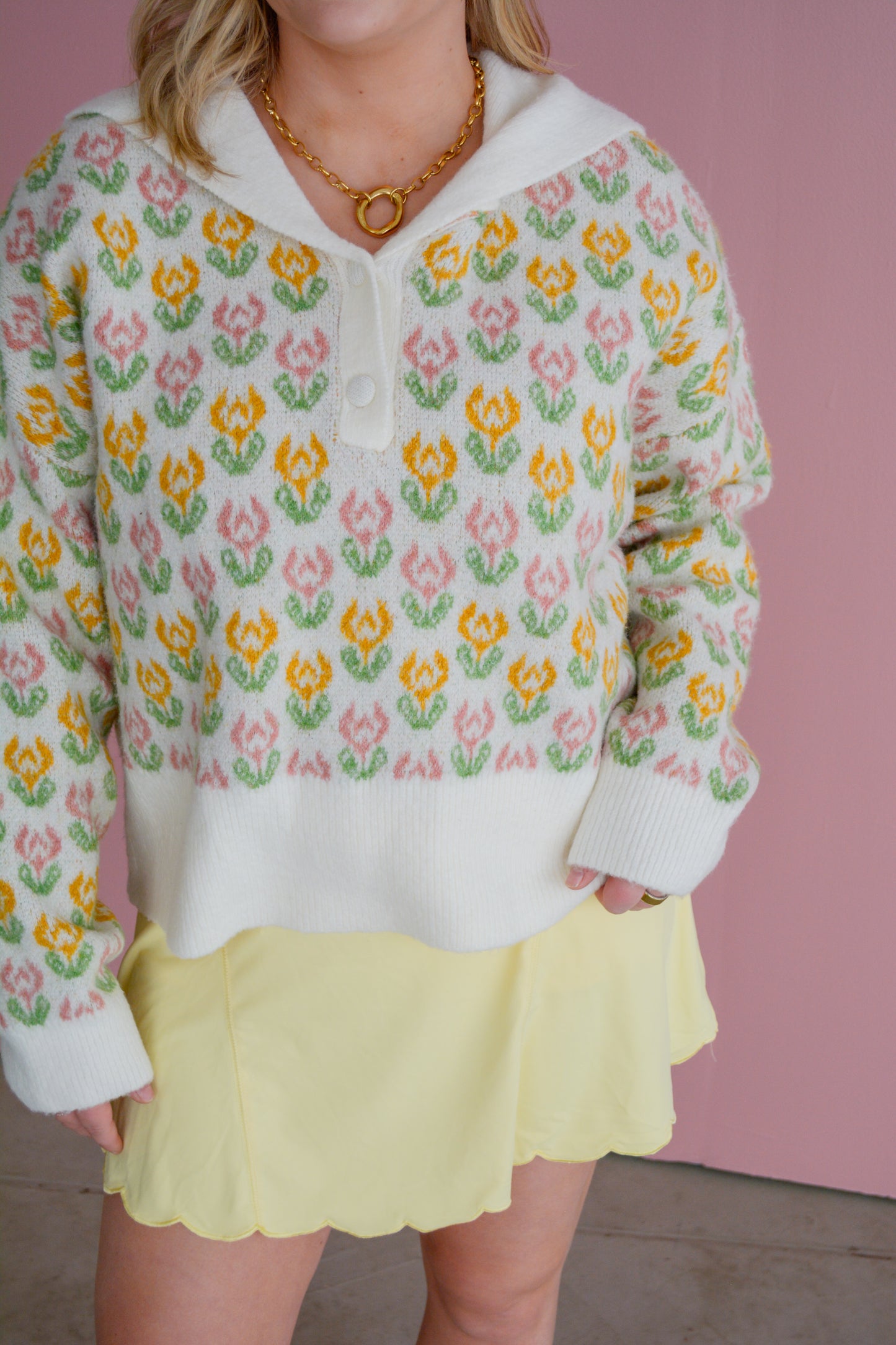 So Me Flora Voyage Sweater in cozy knit, featuring floral pattern and relaxed fit, displayed on a hanger.