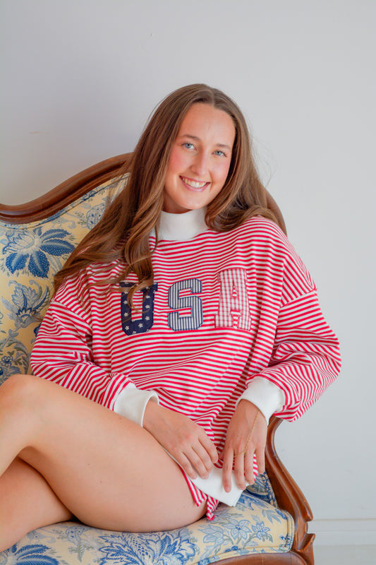 LE LIS USA Set featuring stylish clothing with a patriotic design, displayed on a neutral background.