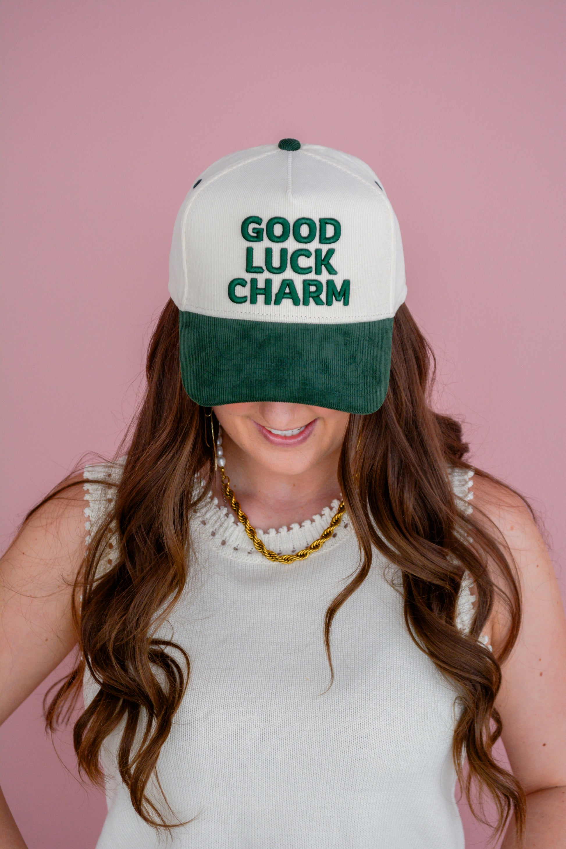 Kenzkustoms Good Luck Charm Hat featuring a colorful embroidered charm on a casual baseball cap.