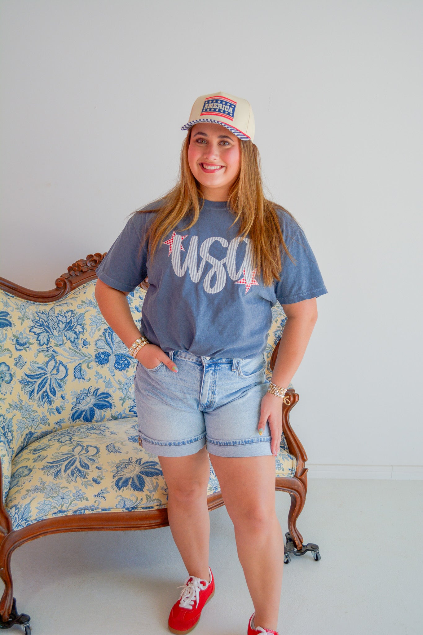 Summer Tees America hat with wide brim and adjustable strap, shown on a neutral background.