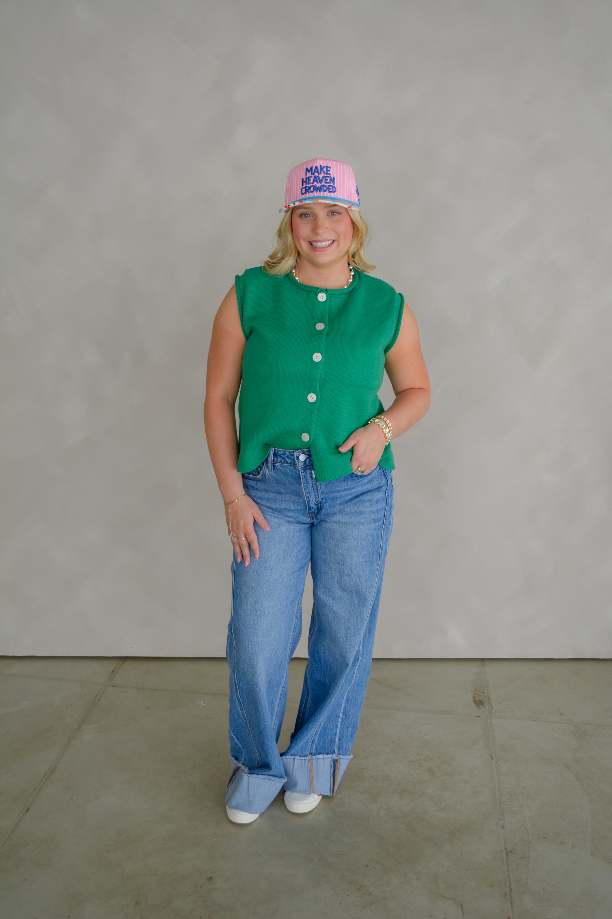 Vervet Downtown Darling denim jeans displayed on a model, featuring classic five-pocket design and a fitted silhouette.