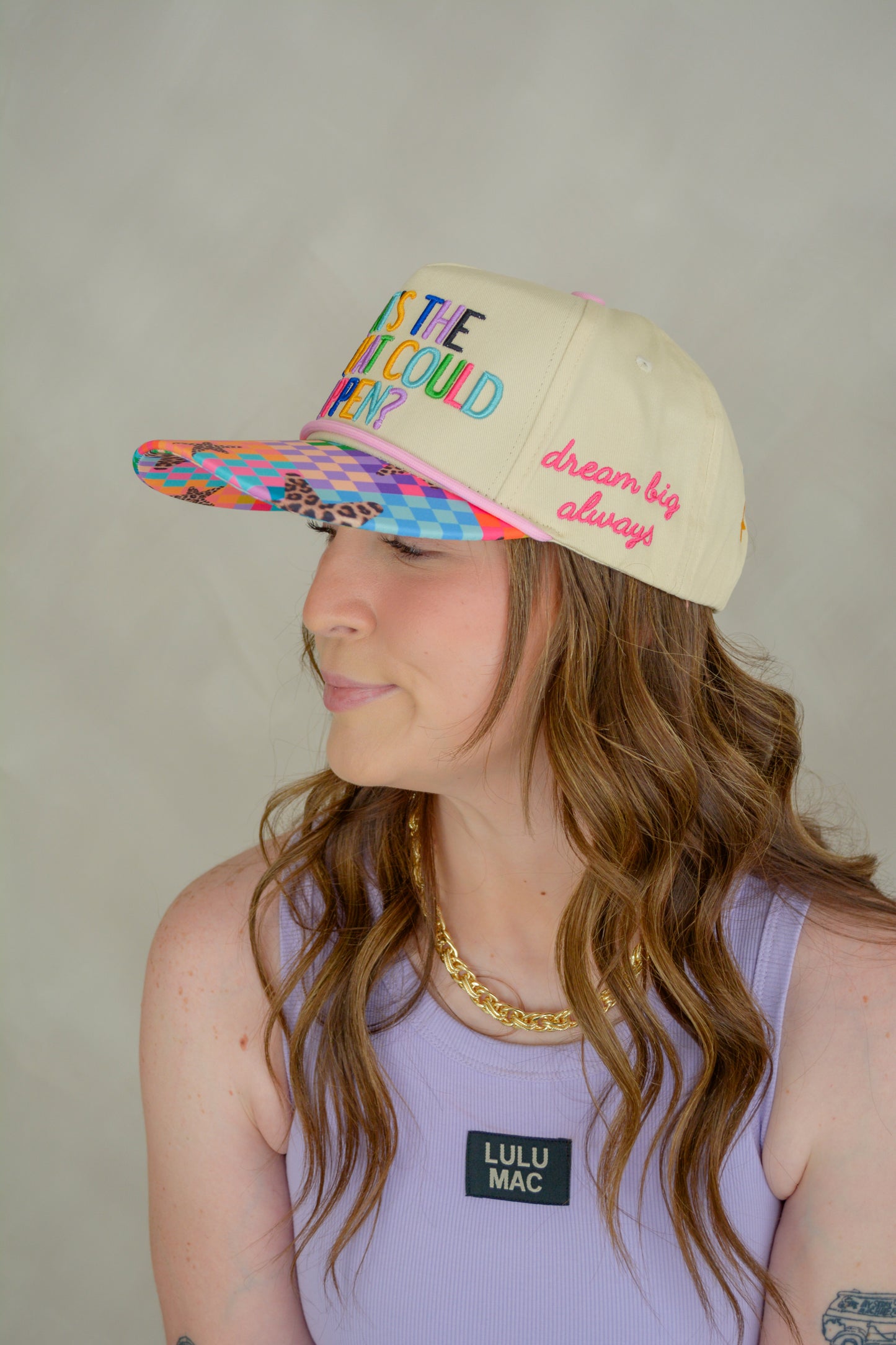 Poppy & Pine “What’s The Best That Could Happen” hat with a casual, stylish design, featuring embroidered text and a comfortable fit.