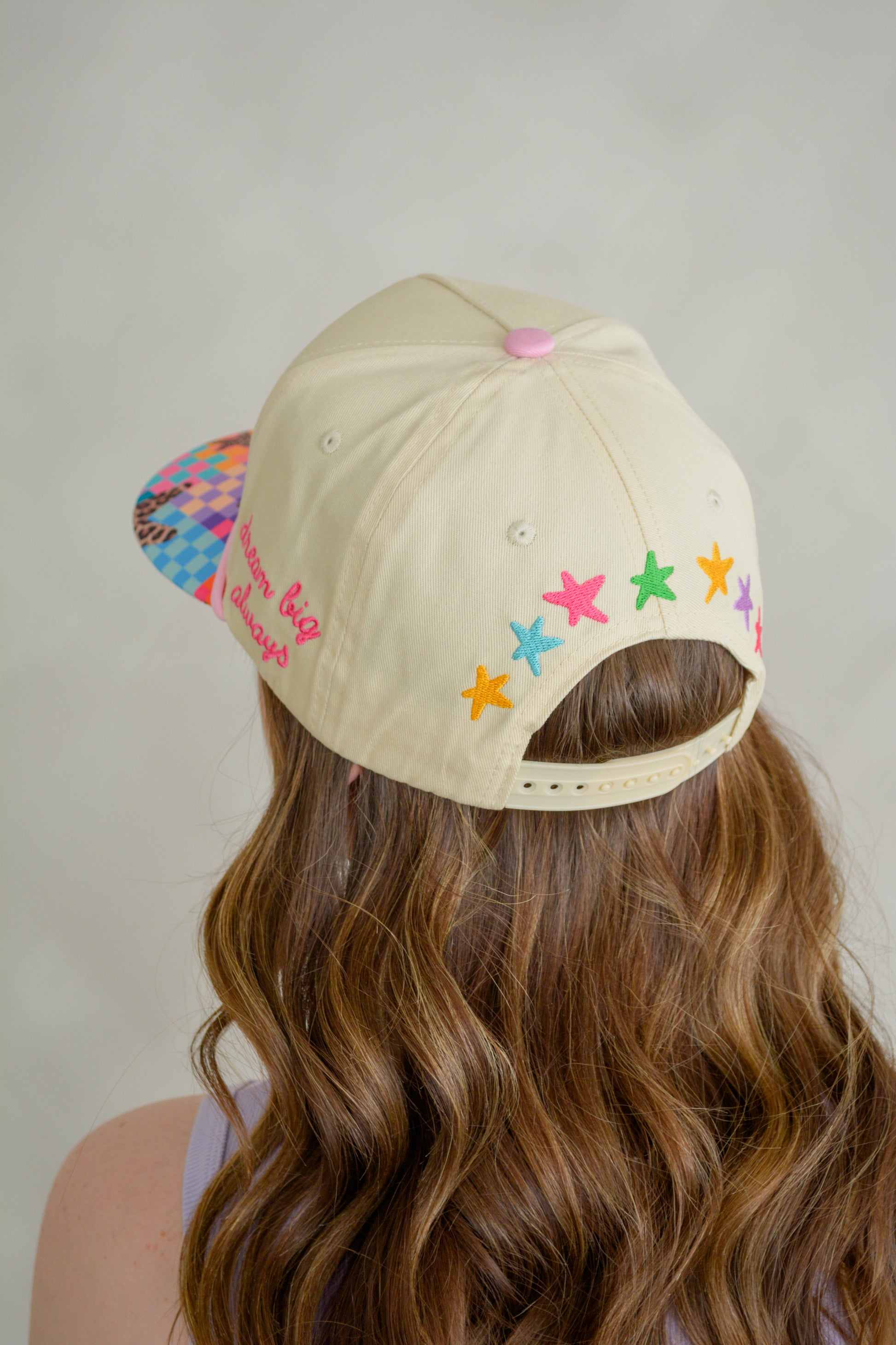 Poppy & Pine "What’s The Best That Could Happen" hat featuring a casual, stylish design with a curved brim and adjustable strap.