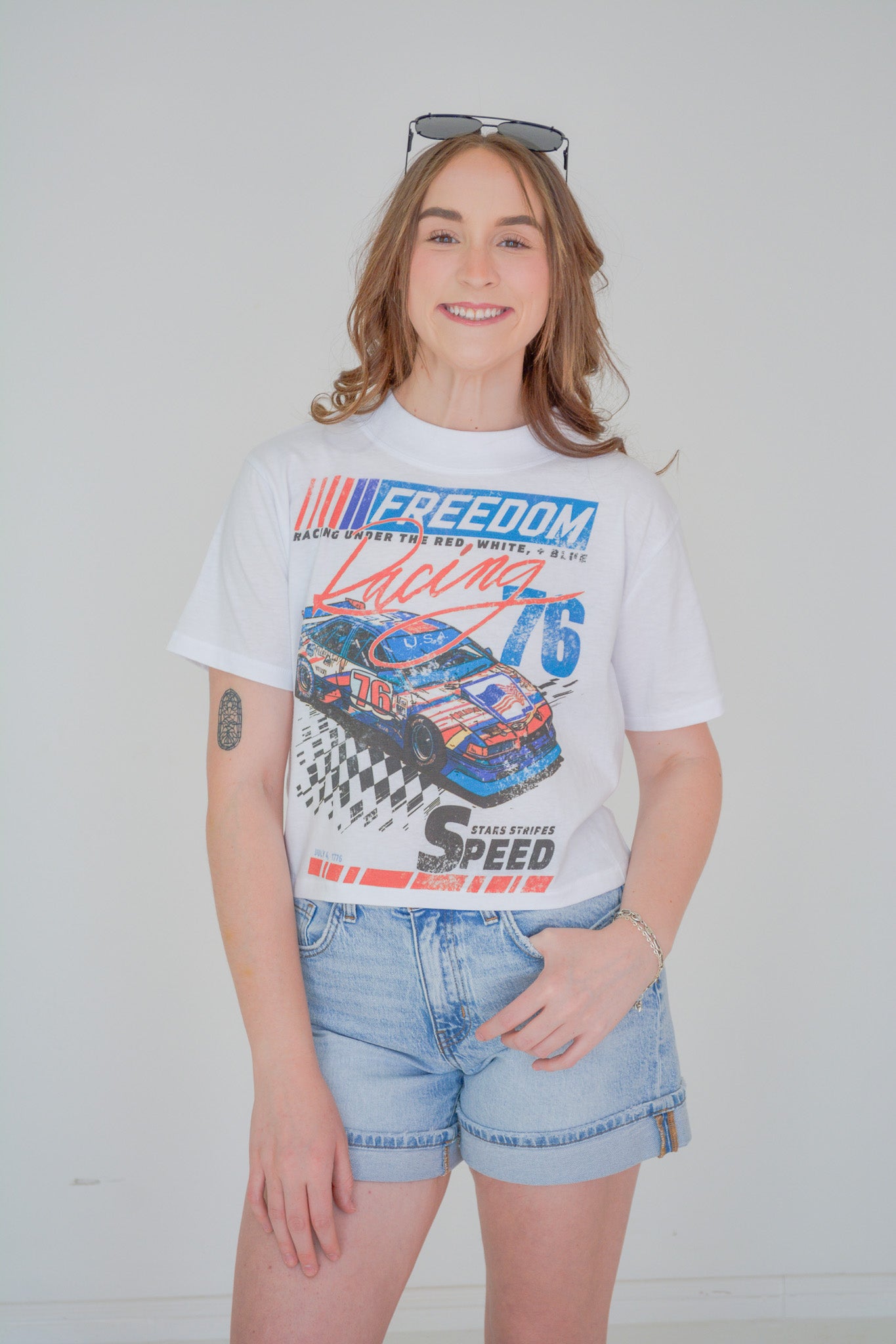 Chaudoin Creations Stars Stripes & Speed cropped T-shirt with patriotic star and stripe design, casual fit, on a white background