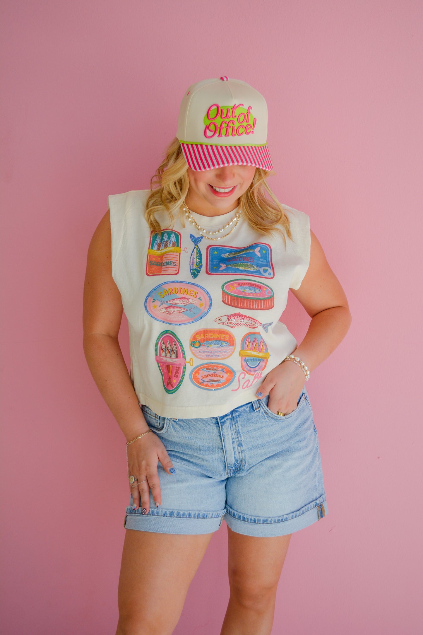 Sardine Summer Muscle Tank by Summer Tees displayed on a hanger, showcasing a casual sleeveless top with bold sardine print.