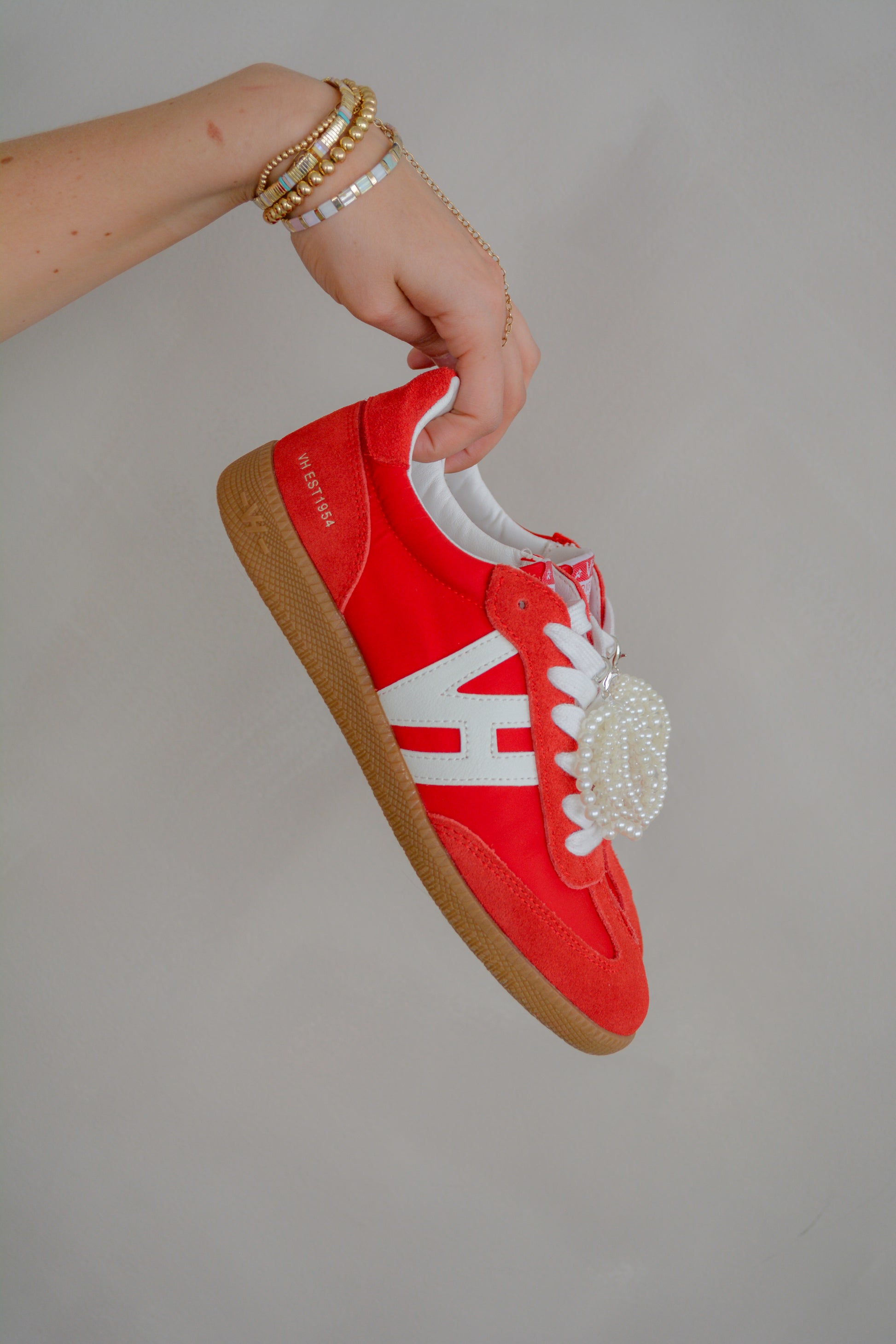 Vintage Havanna Nadia Sneakers featuring classic design, white laces, and comfortable rubber soles on a neutral background.