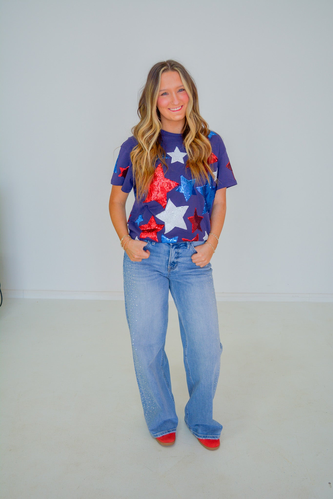 Rjm Glitz Star Spangle Sparkle Tee showing a close-up of the glittering star design on the front of the vibrant t-shirt