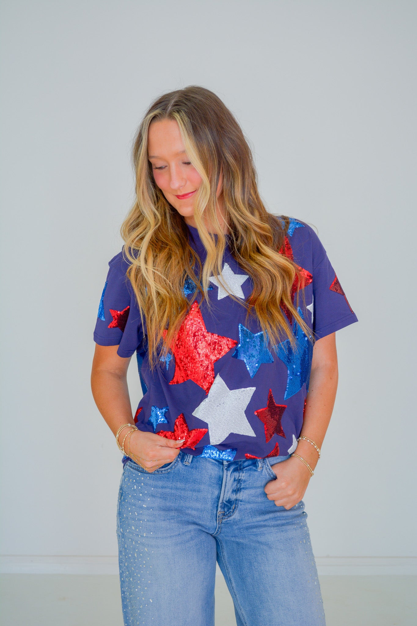 Rjm Glitz Star Spangle Sparkle Tee featuring a shimmering star design on a stylish t-shirt, perfect for casual wear.