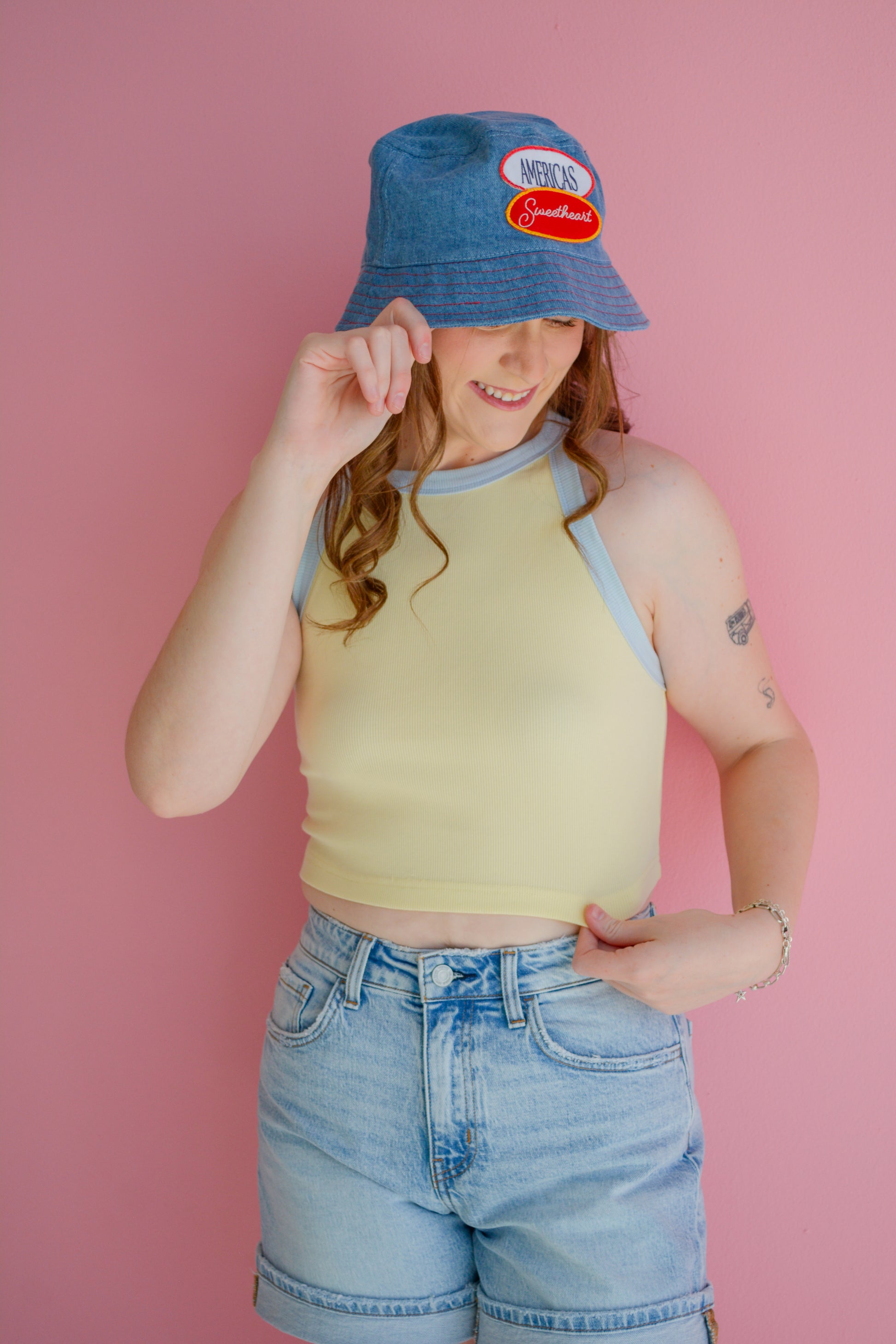 Kaxi America’s Sweetheart bucket hat with floral pattern and wide brim, stylish accessory for casual outdoor wear.
