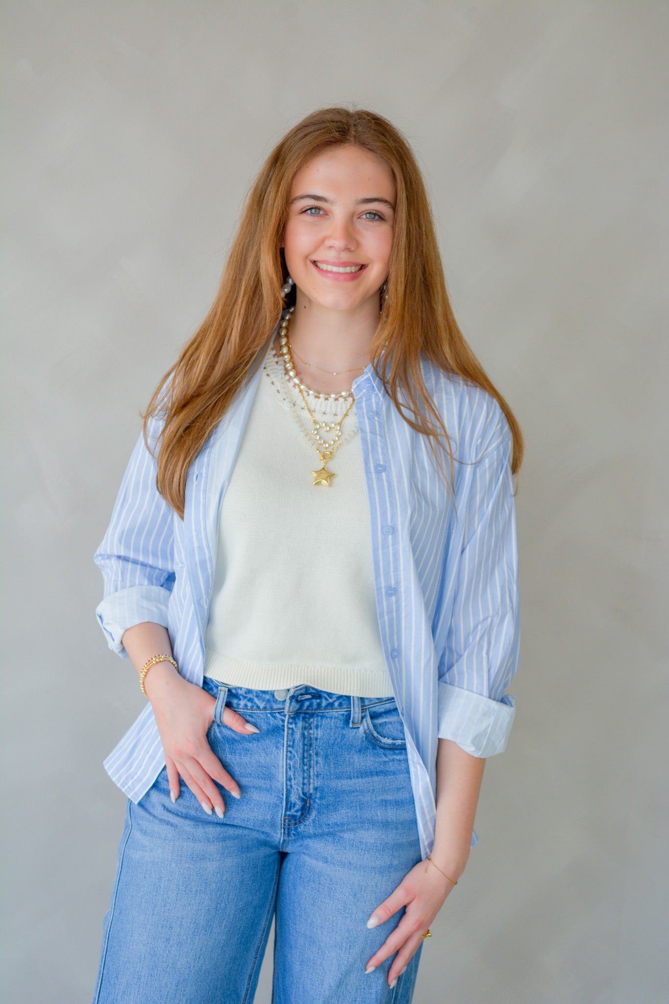 Raisonnel Sail Away Collared Skirt displayed on a hanger, showcasing its nautical-inspired design and lightweight fabric.