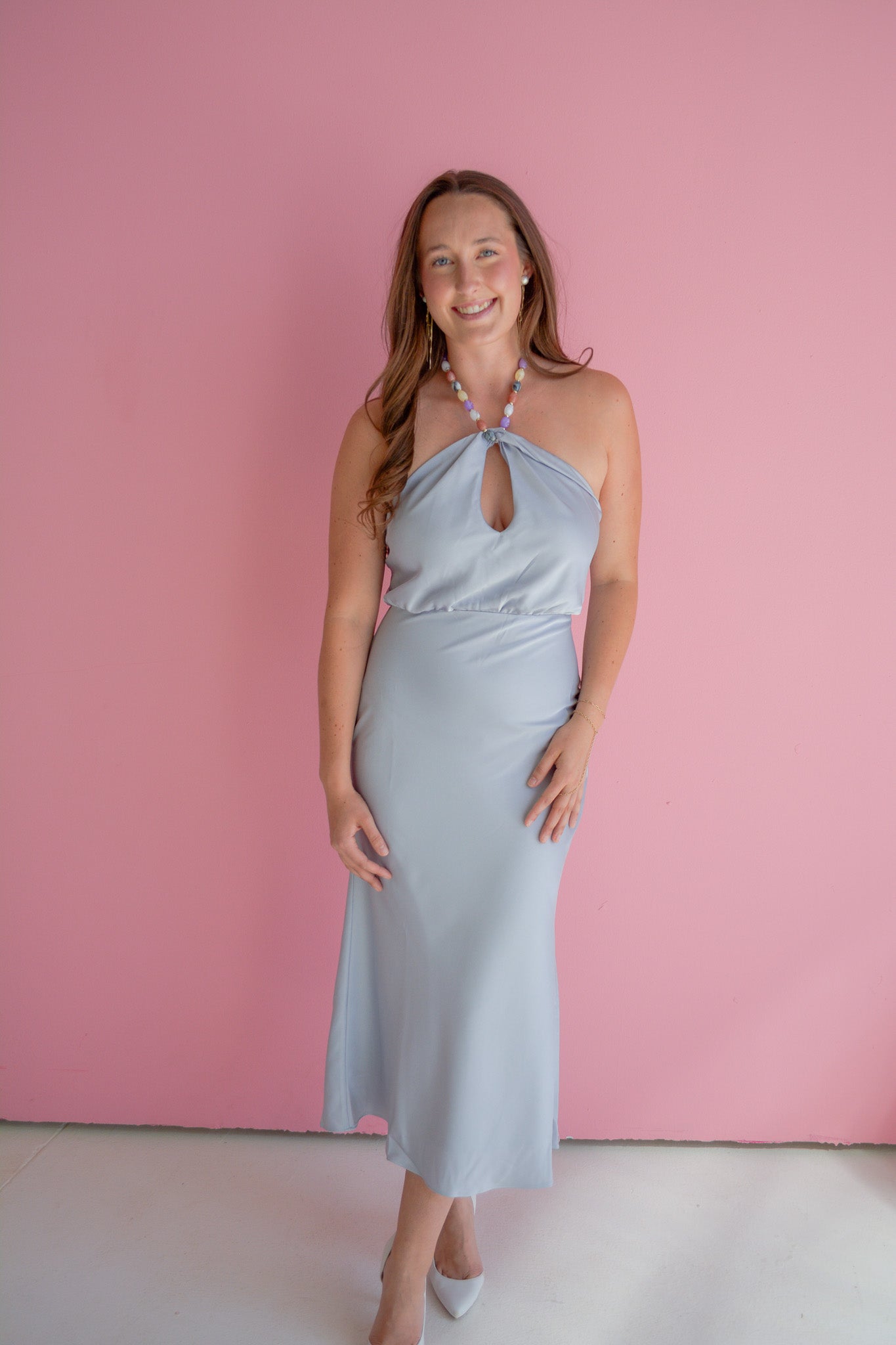 Edit by Nine Starlight Halter Neck Midi Dress displayed on a mannequin, showcasing a stylish, elegant evening dress with halter neckline.