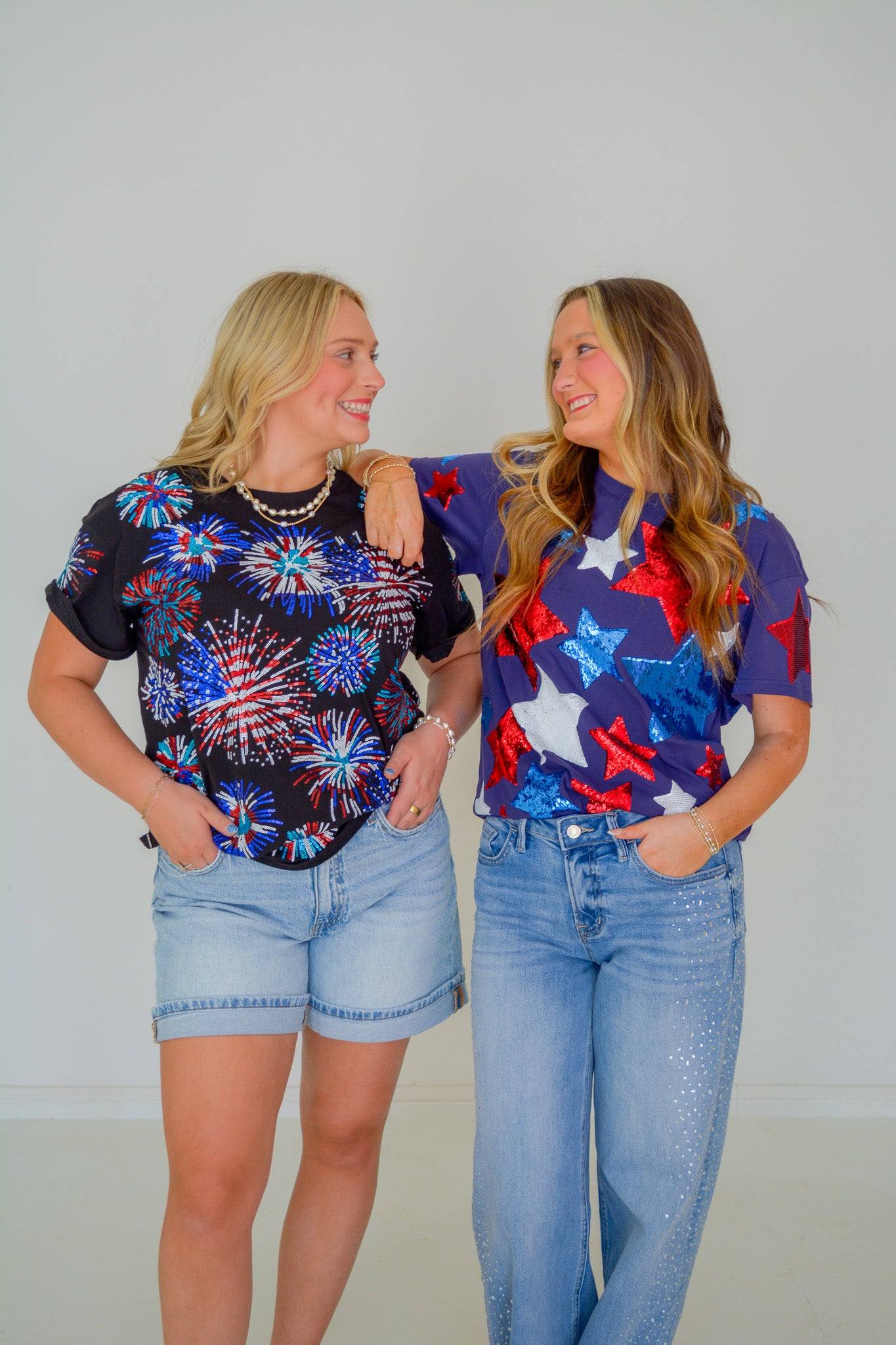 Rjm Glitz Star Spangle Sparkle Tee featuring a shiny star design on a stylish, glittery fabric front.