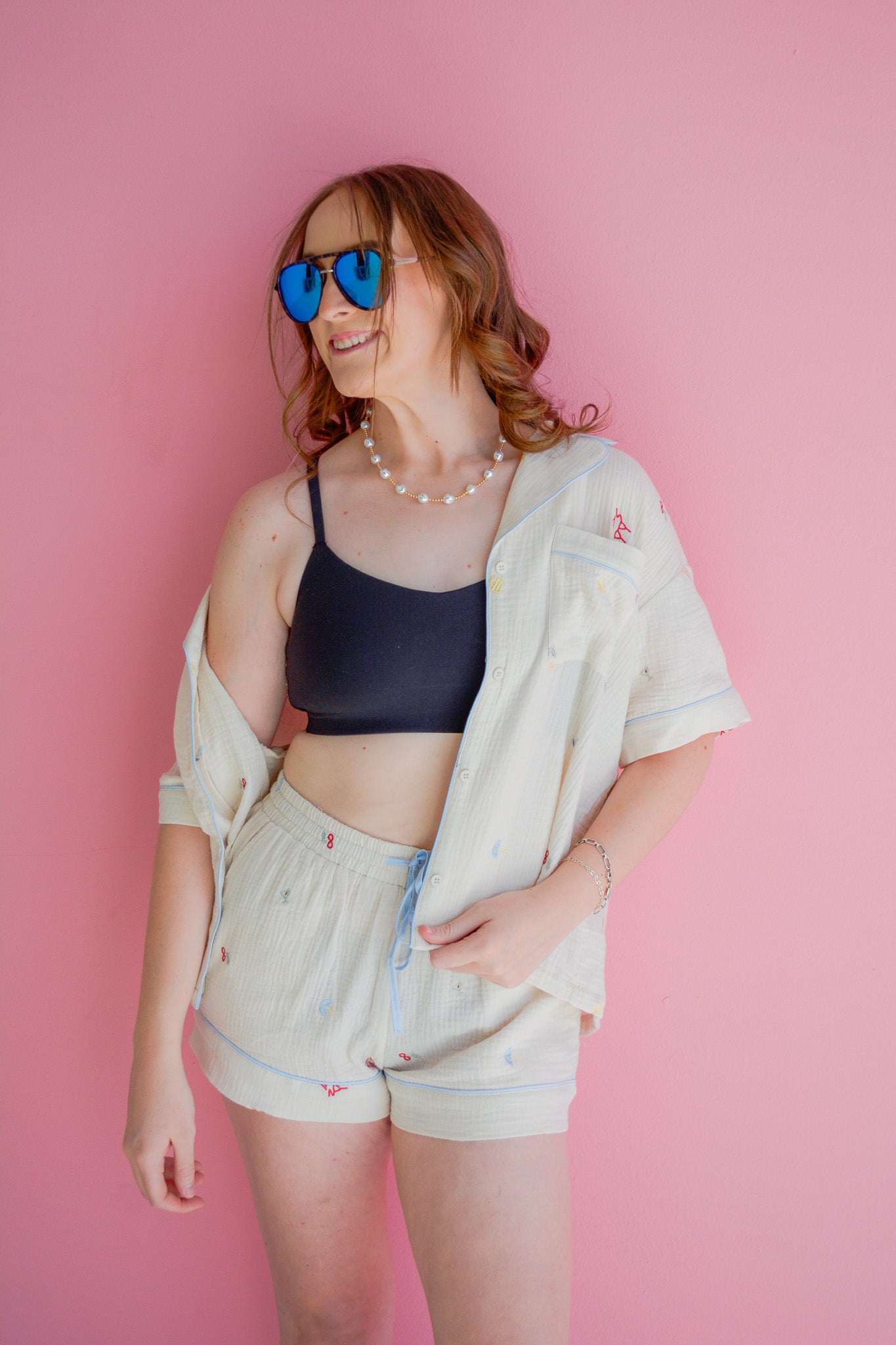 LE LIS The Vacation Edit shorts in light fabric, featuring a relaxed fit and stylish waistband, perfect for summer wear.