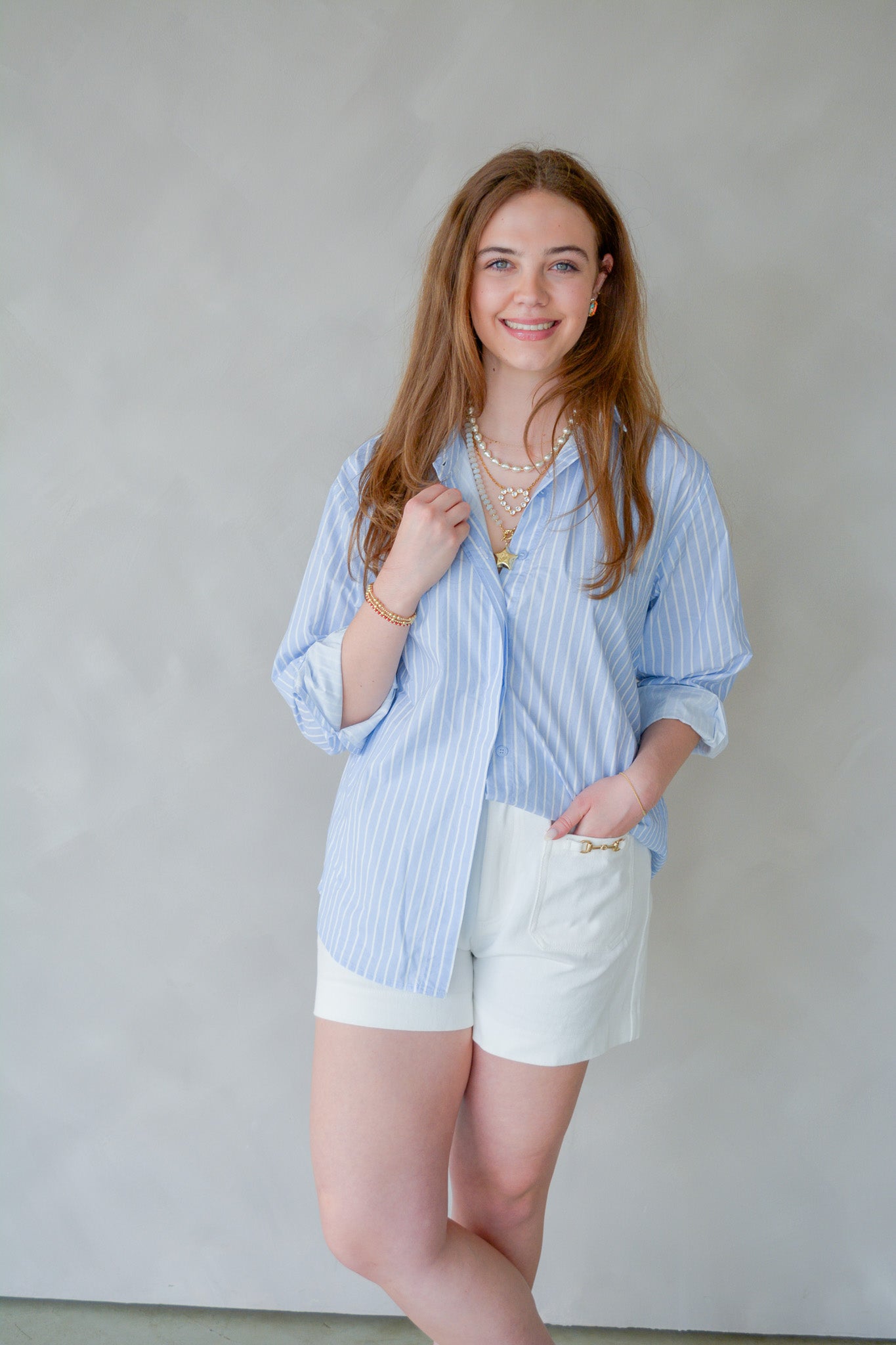 Raisonnel Sail Away collared skirt with button details, navy fabric, and a stylish, nautical-inspired design.