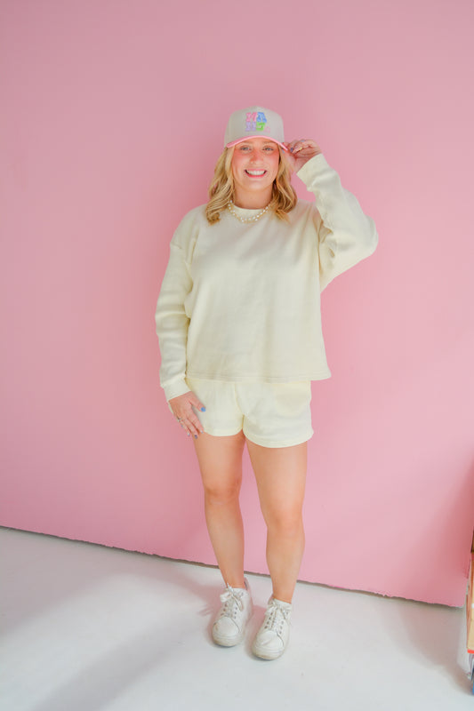 Lulu Mac Buttercup Breeze waffle knit shorts with a relaxed fit and soft texture, shown on a model.