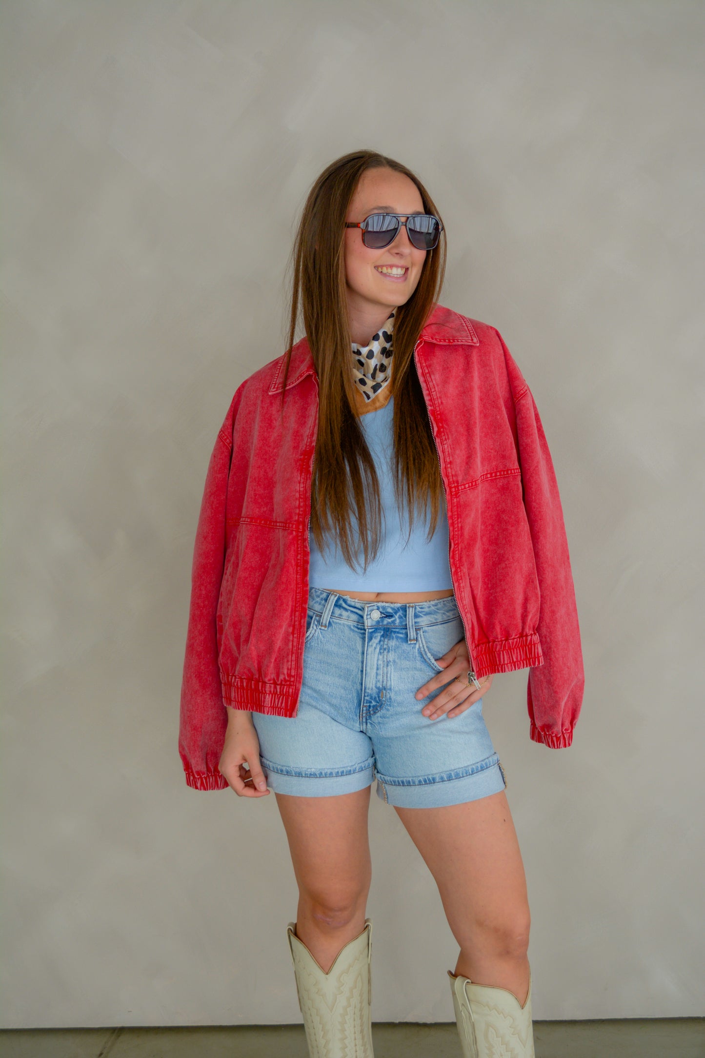 Vervet The Weekend Cuffed Shorts in denim, showcasing a relaxed fit with rolled cuffs and front pockets.