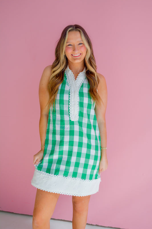 Brianna Cannon Picnic Darling Dress displayed on a hanger with floral pattern and lightweight fabric, ideal for outdoor summer events.