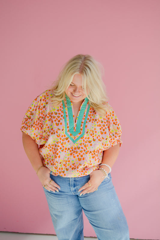 Entro Sunset Sorbet Blouse for Curvy women, featuring vibrant sunset colors and lightweight fabric.