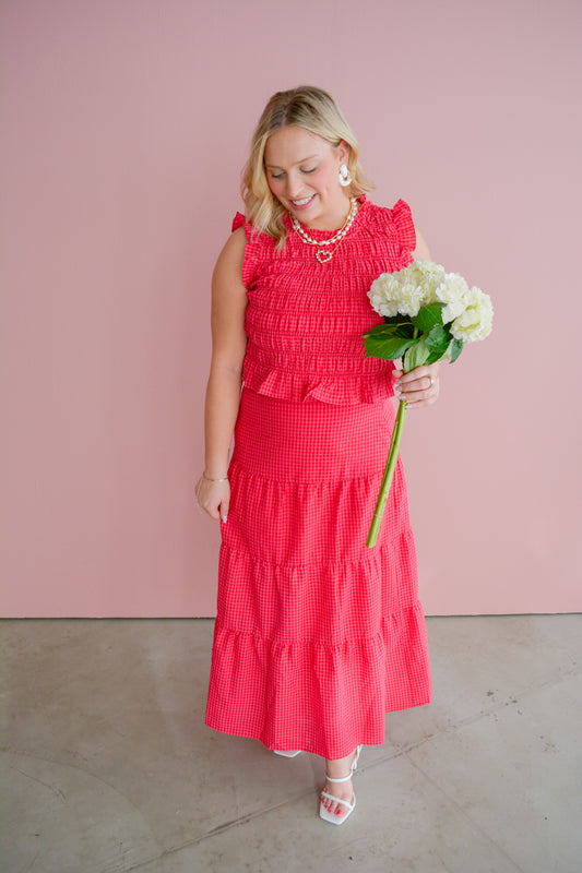 Honey Meadow Midi Skirt by Day + Moon, showcasing a flowy, floral-patterned skirt with a high waist and lightweight fabric.