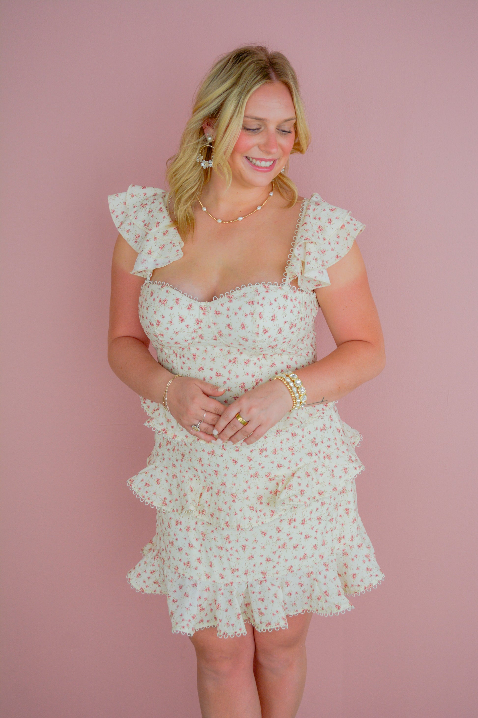 Mable Annie May Dress in floral print with short sleeves and a fitted waist, displayed on a hanger.