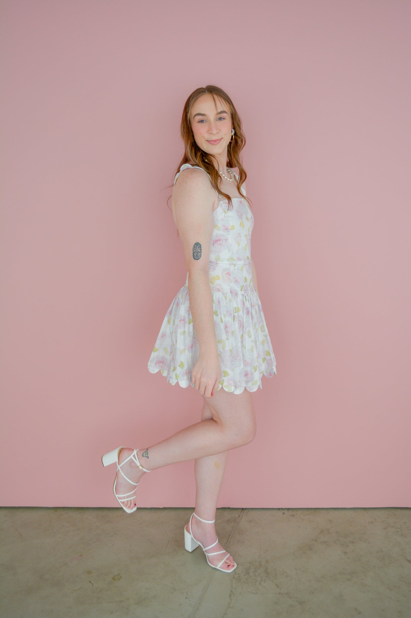Mable Sweet Summer Songs Dress displayed on a hanger, featuring a light, flowy fabric with floral print and sleeveless design.